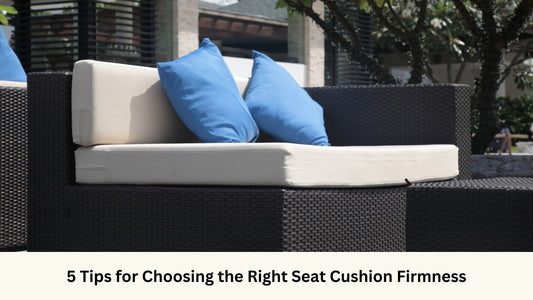 Outdoor sofa with black frame and white seat cushions