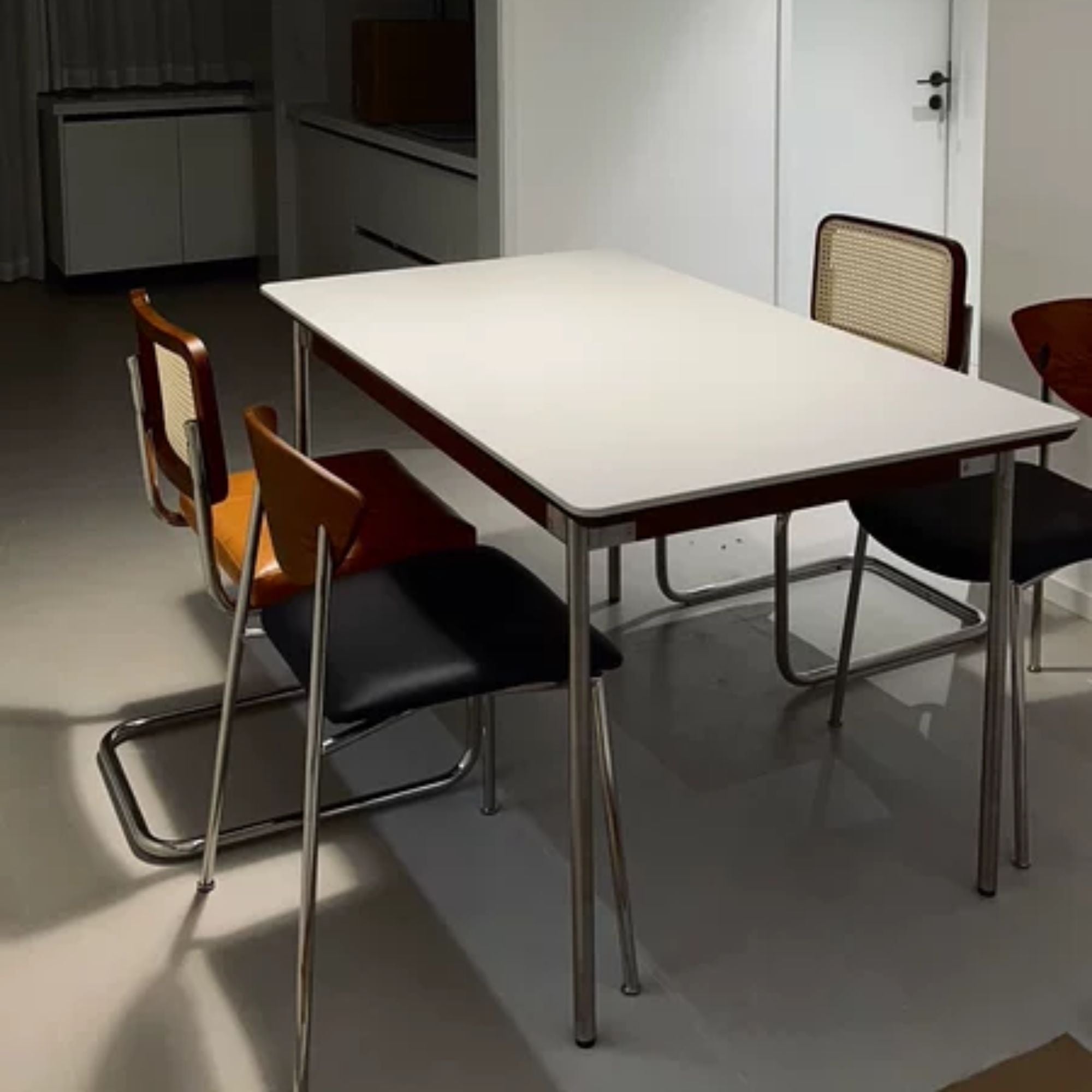 Taylor white sintered stone dining table in dining room