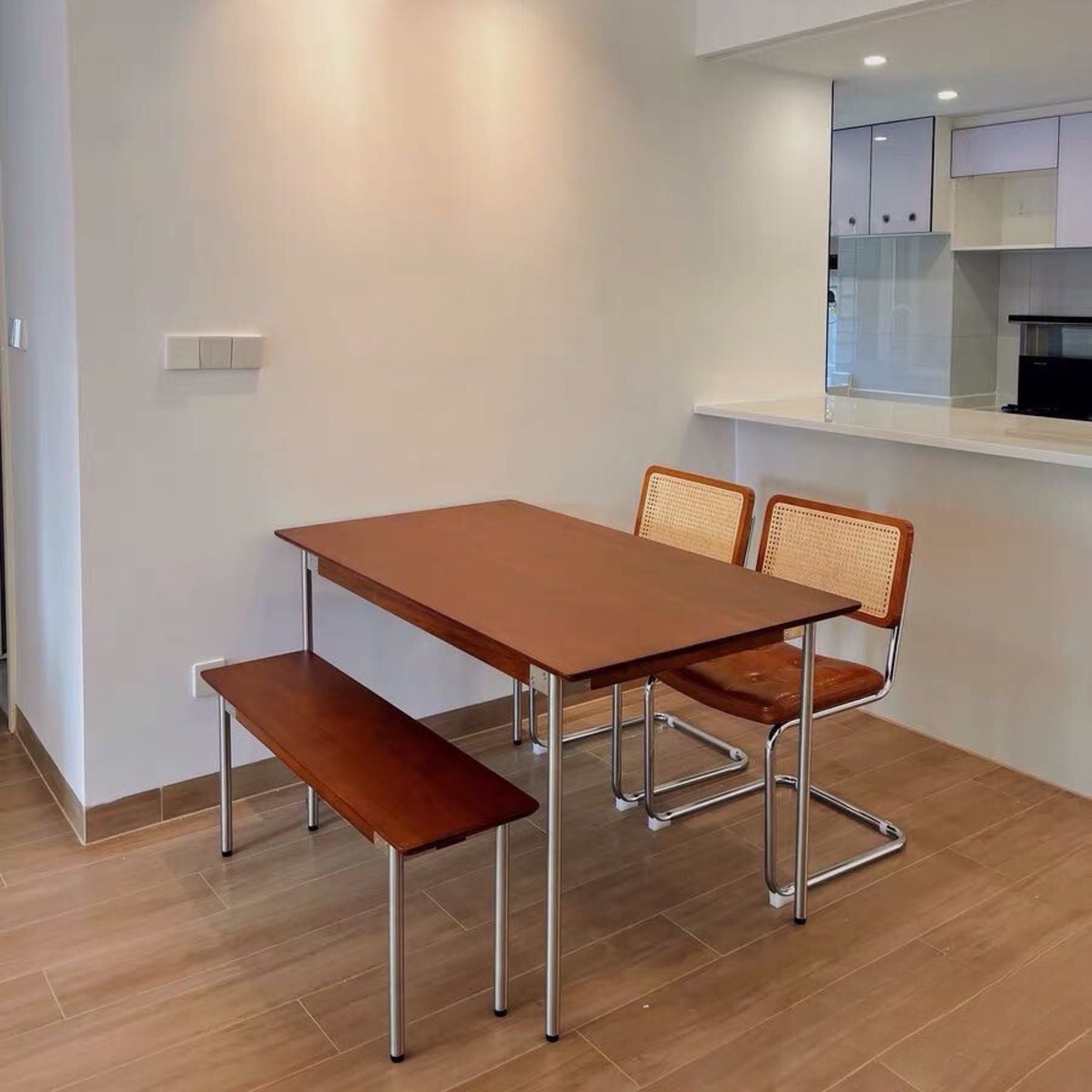 Taylor wood dining table in open concept kitchen and living room