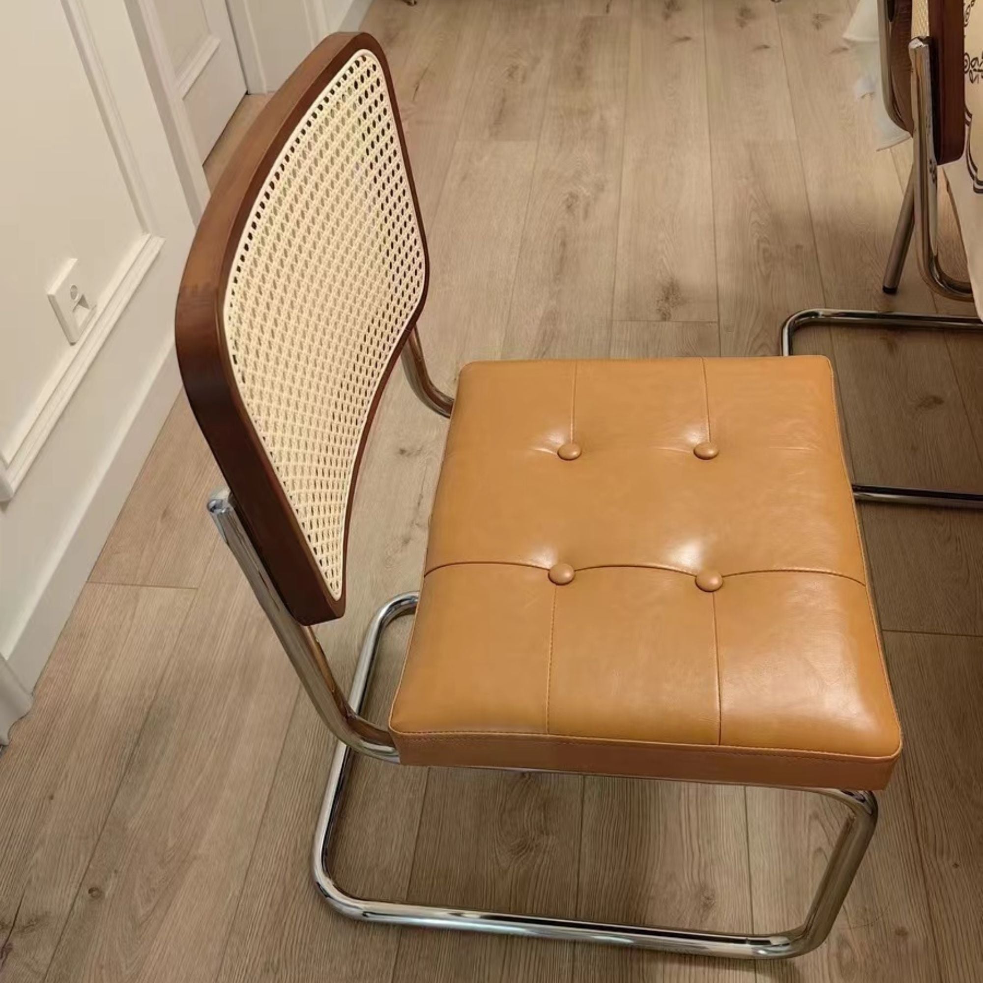 Real home focus shot of Zephyr stainless steel chair