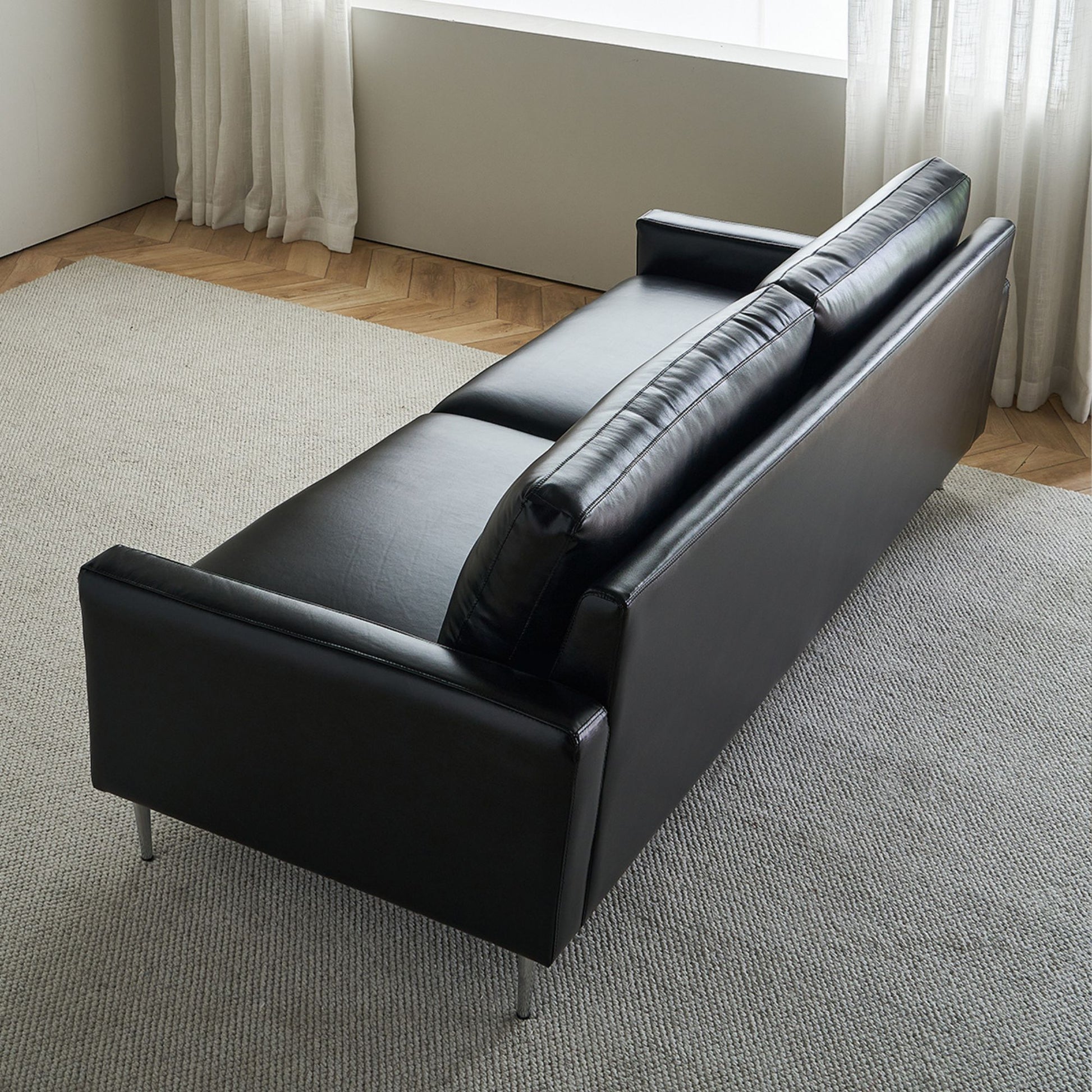 Coach faux leather sofa black