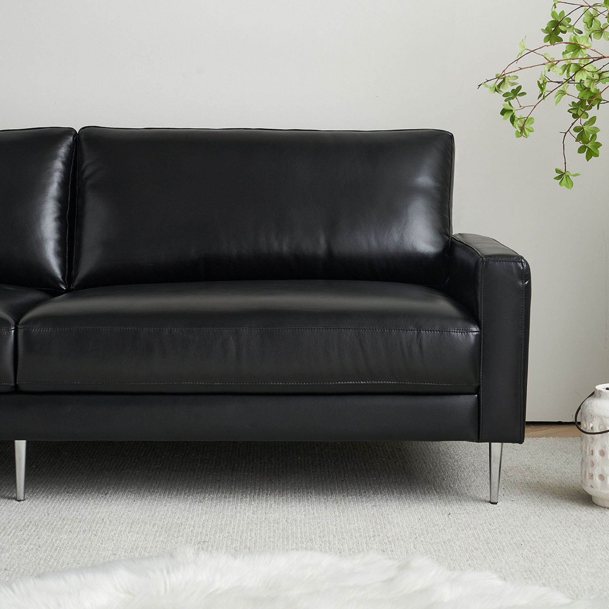 Coach faux leather sofa black