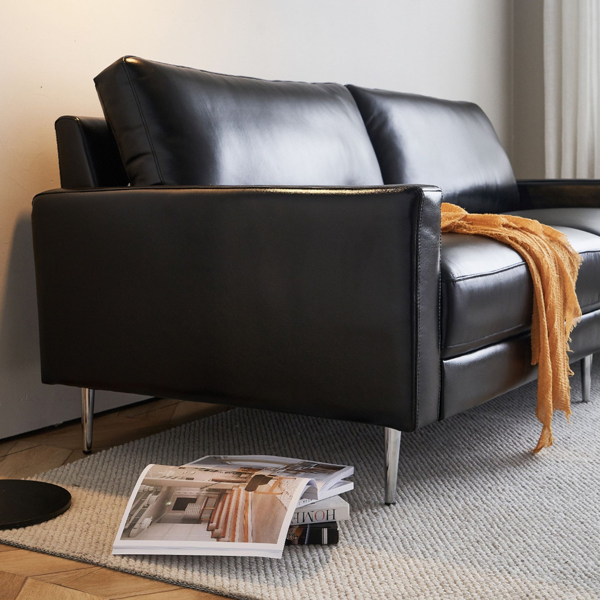 Coach faux leather sofa black