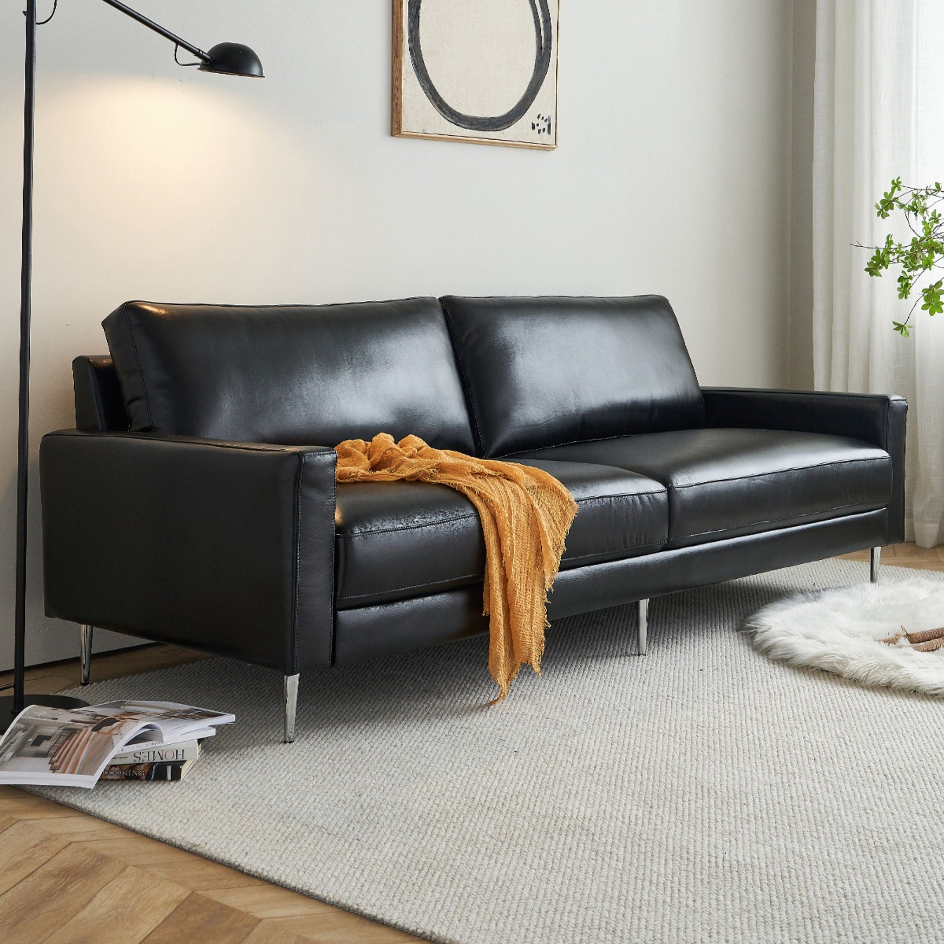 Coach faux leather sofa black