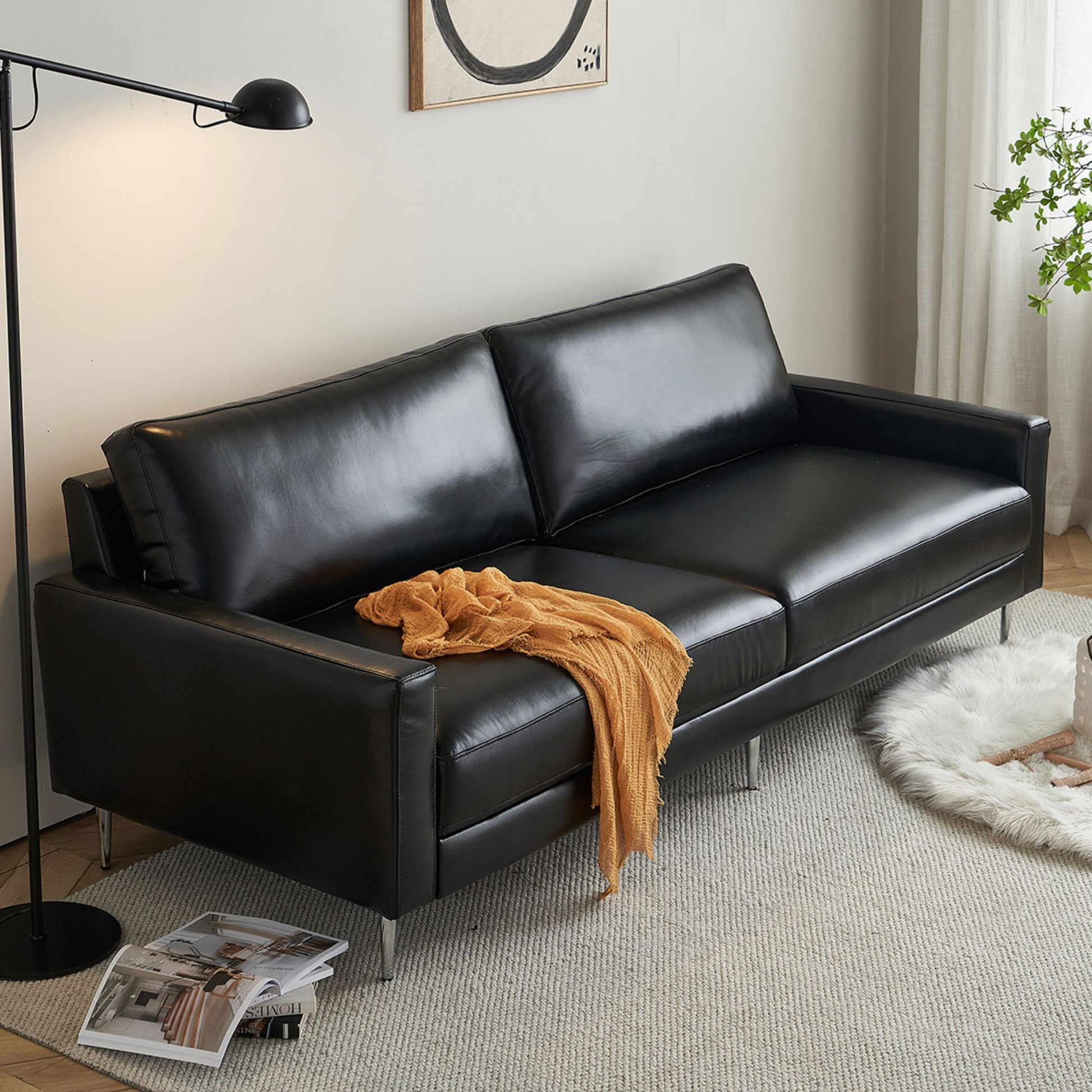 Coach half leather sofa black