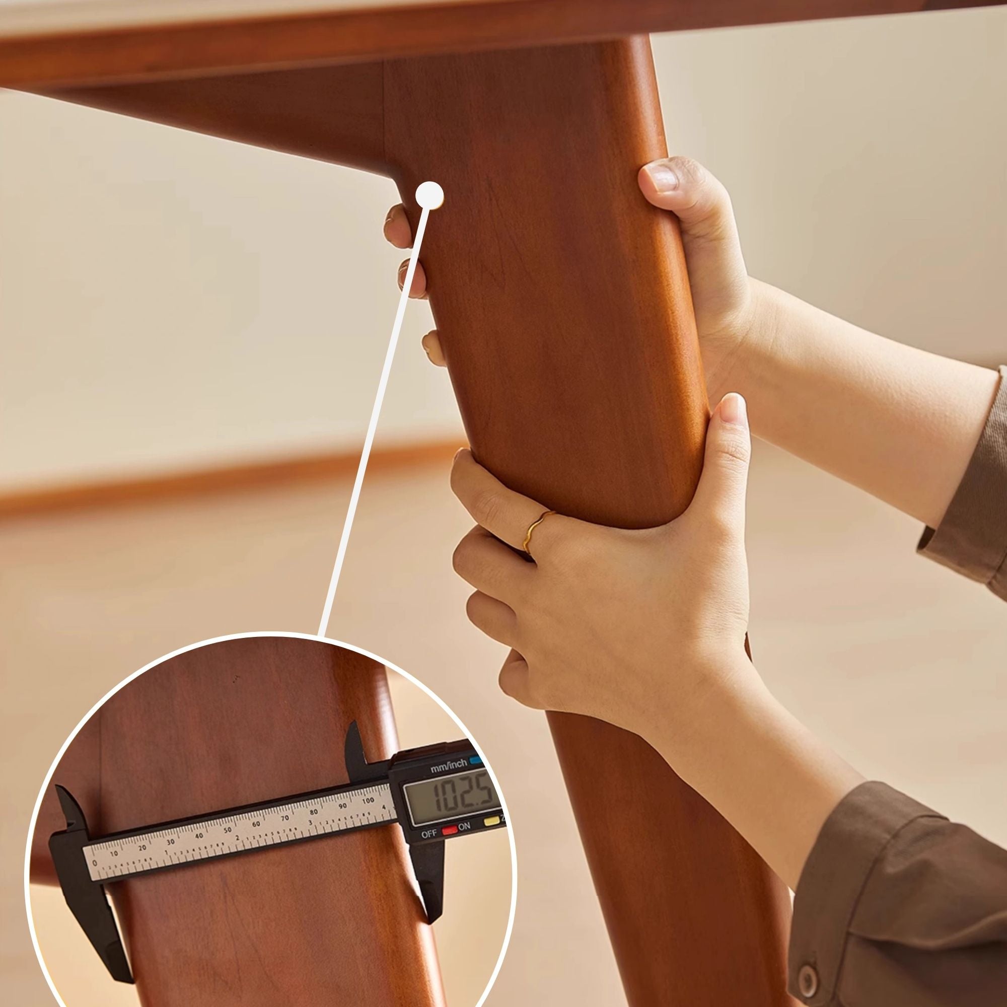 Photo with measurement of leg thickness for Trevor sintered stone table