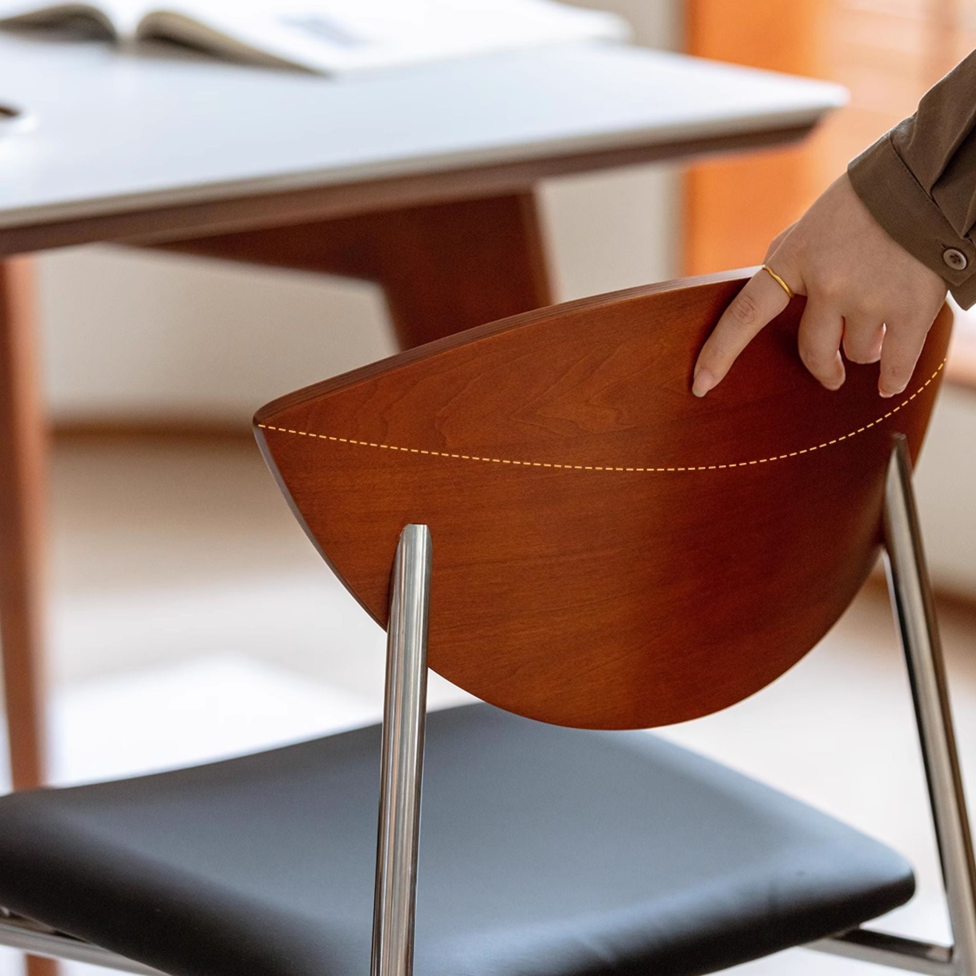 Curved backrest for Tyra stainless steel chair
