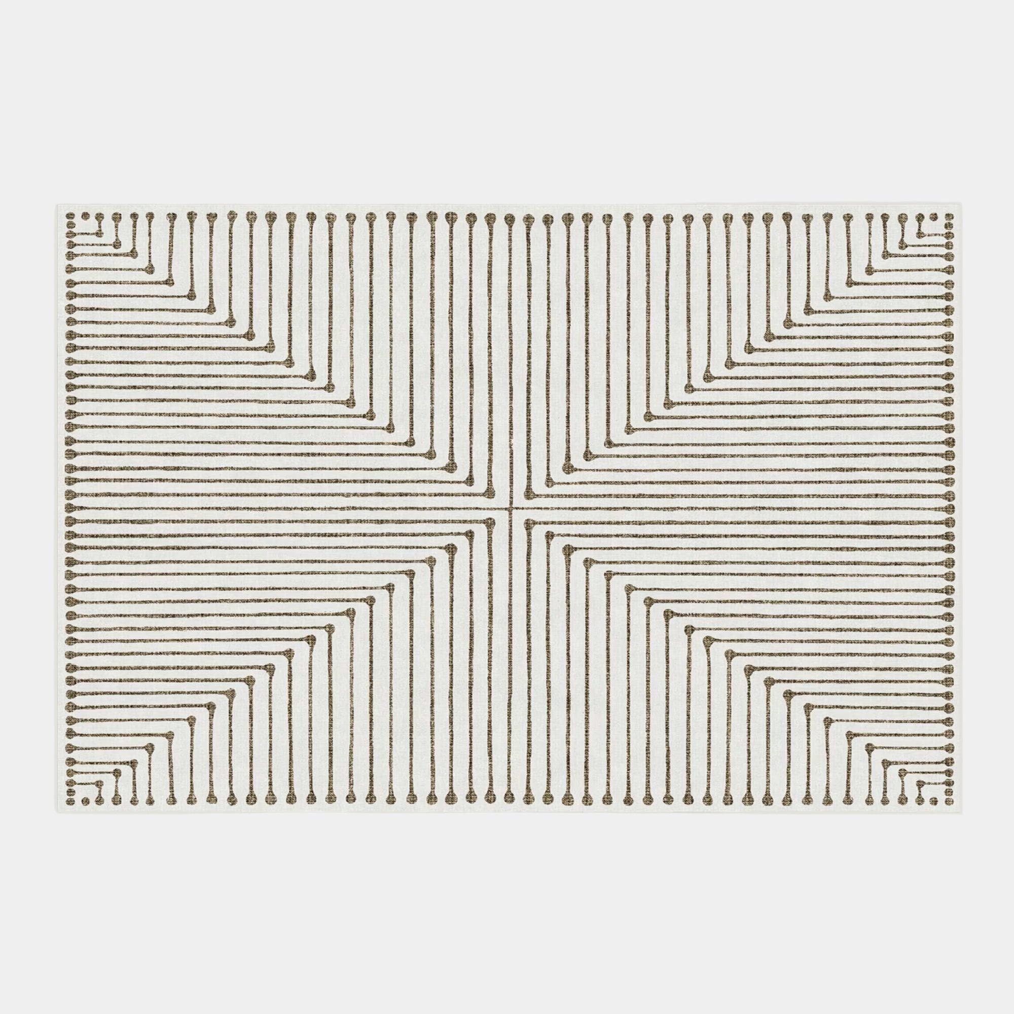 Inkdrop design beige coloured rug