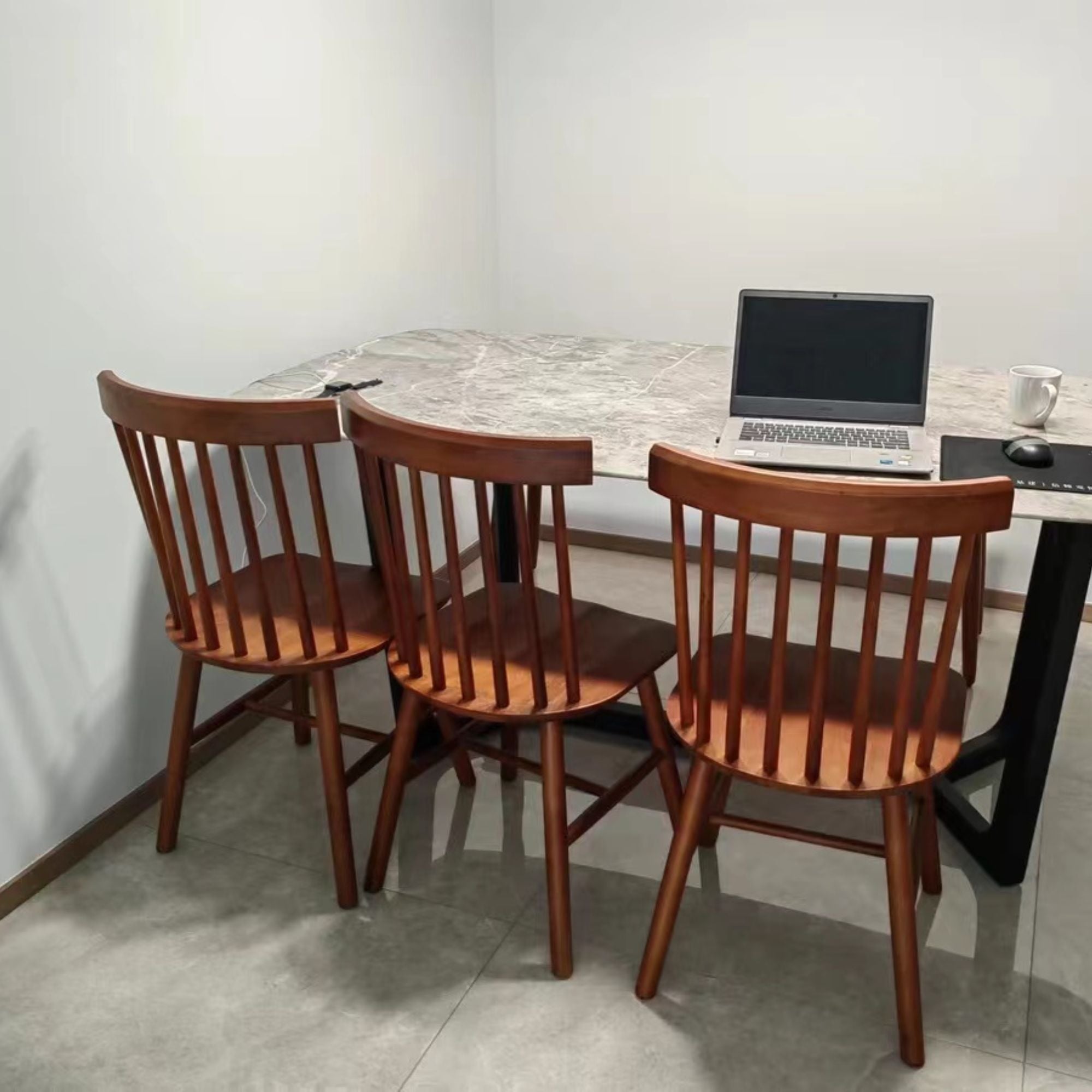 Toby poplar wood char used for table with laptop on it