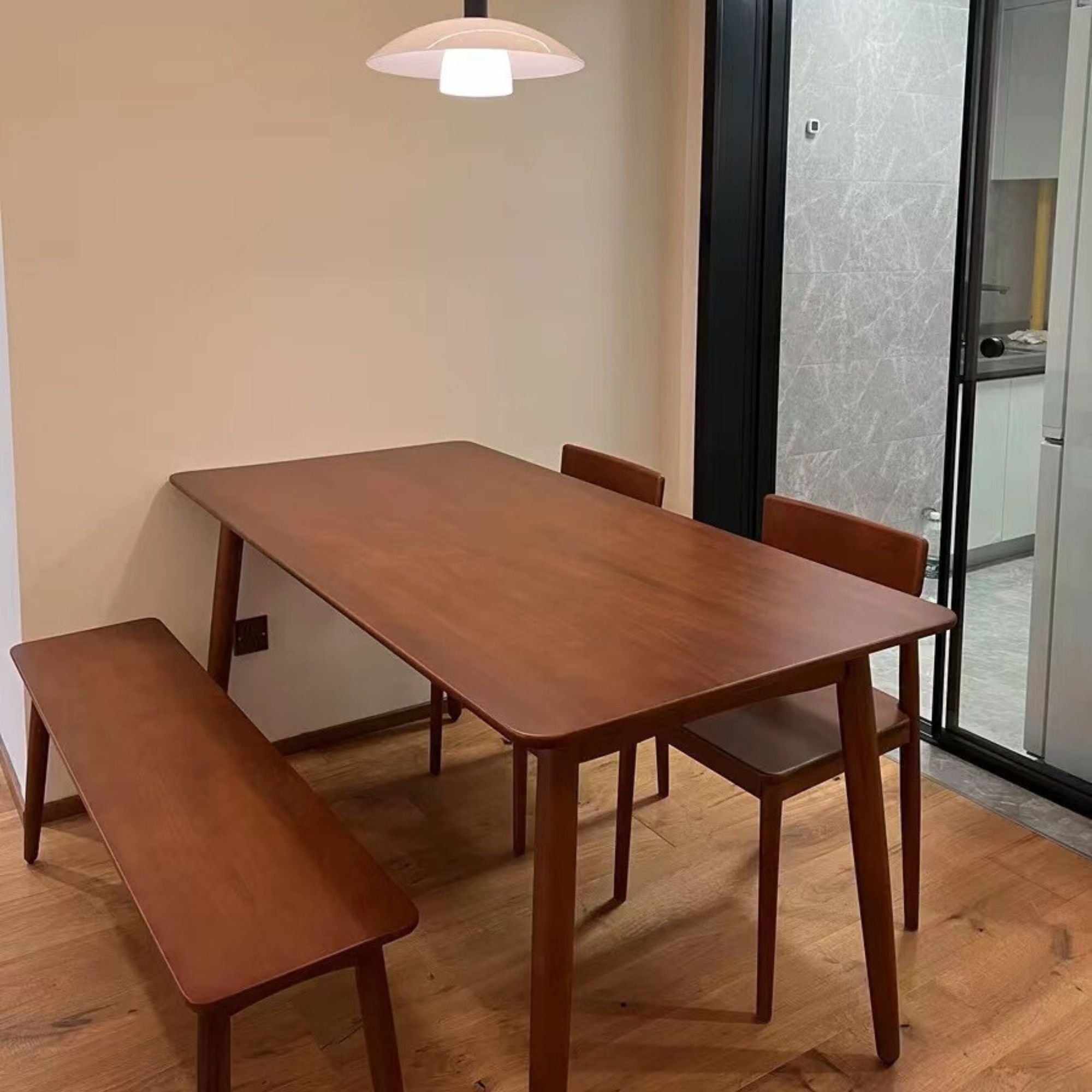 Tranquil wood bench as dining set