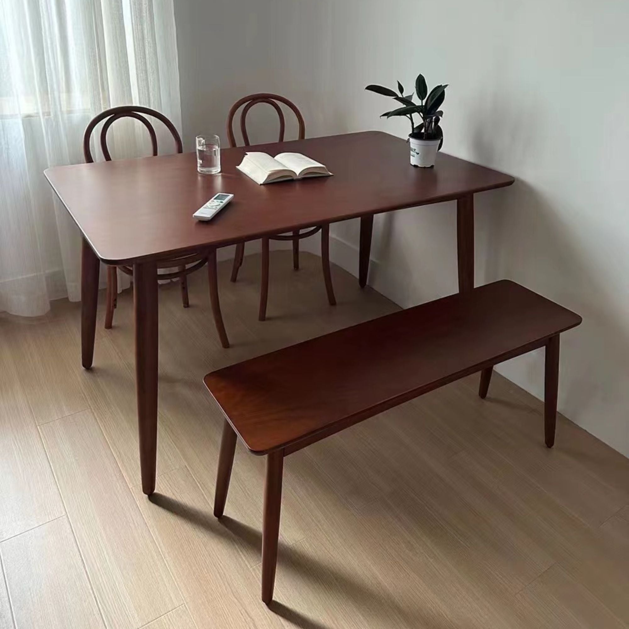 Tranquil wood bench as dining set