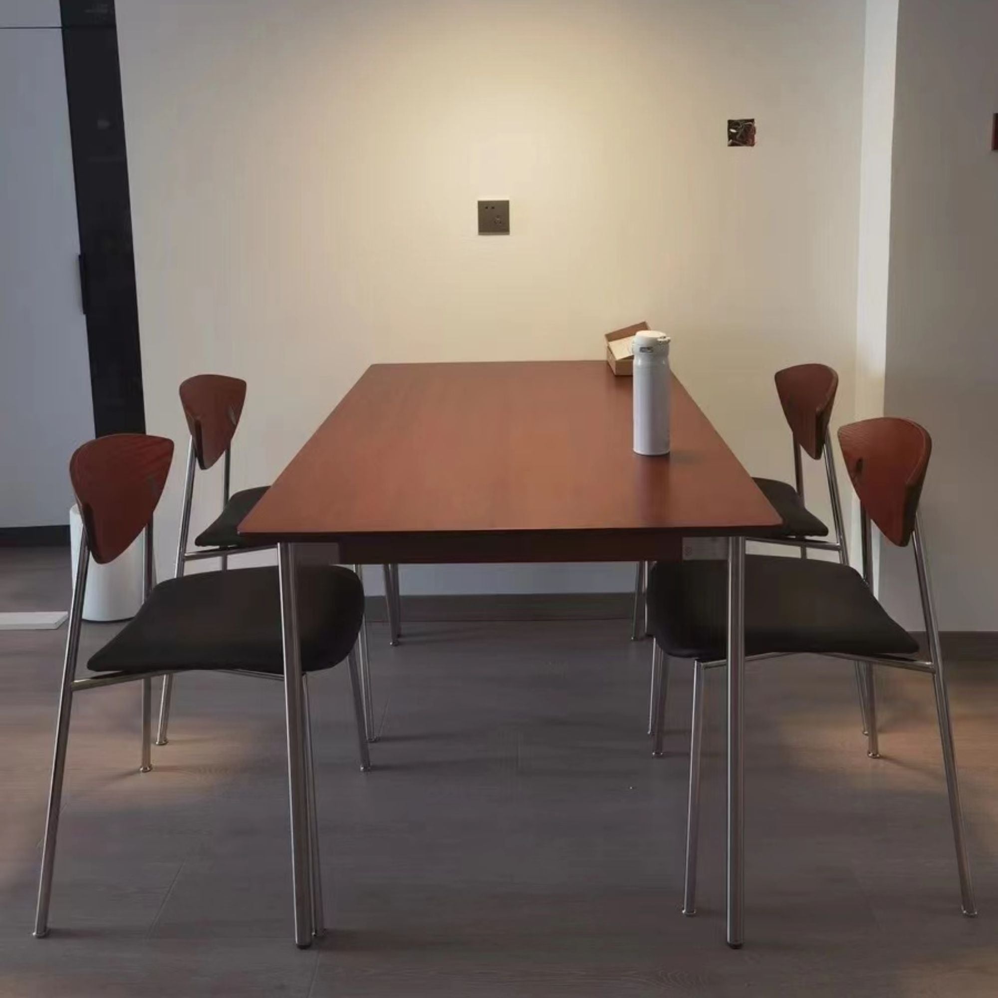 Tyra stainless steel chair as part of dining table set