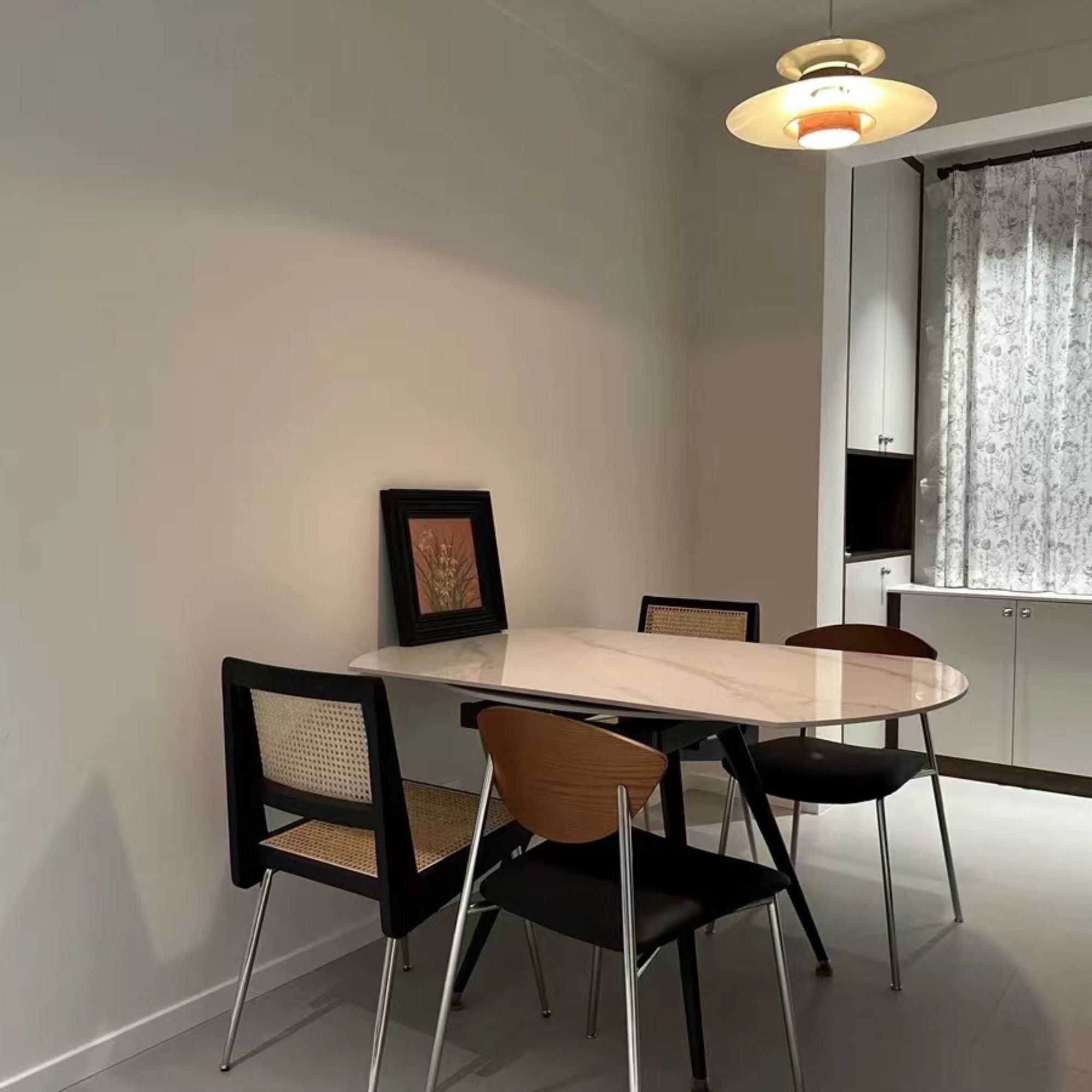 Tyra stainless steel chair as part of dining table set