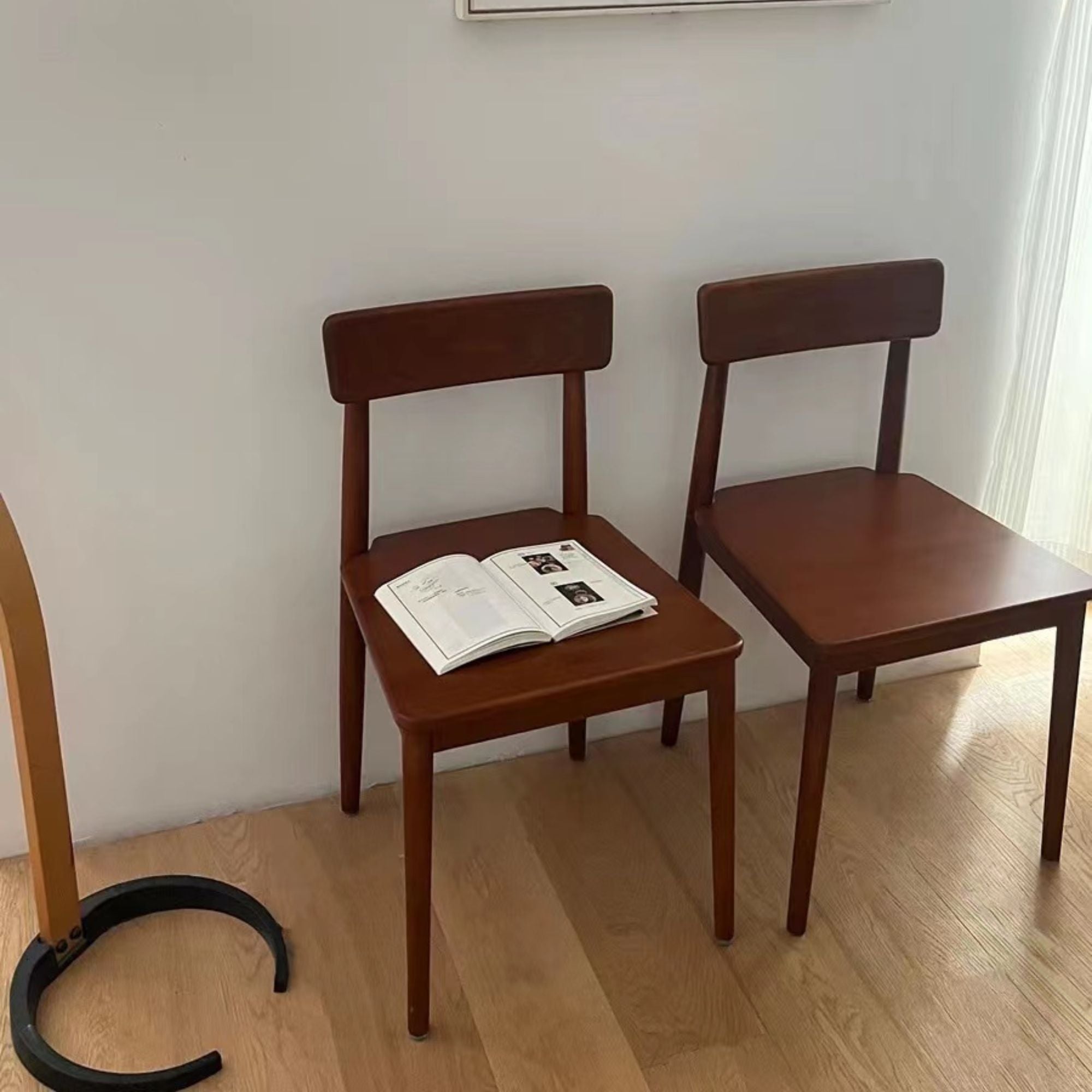 2 tranquil poplar wood chairs side by side