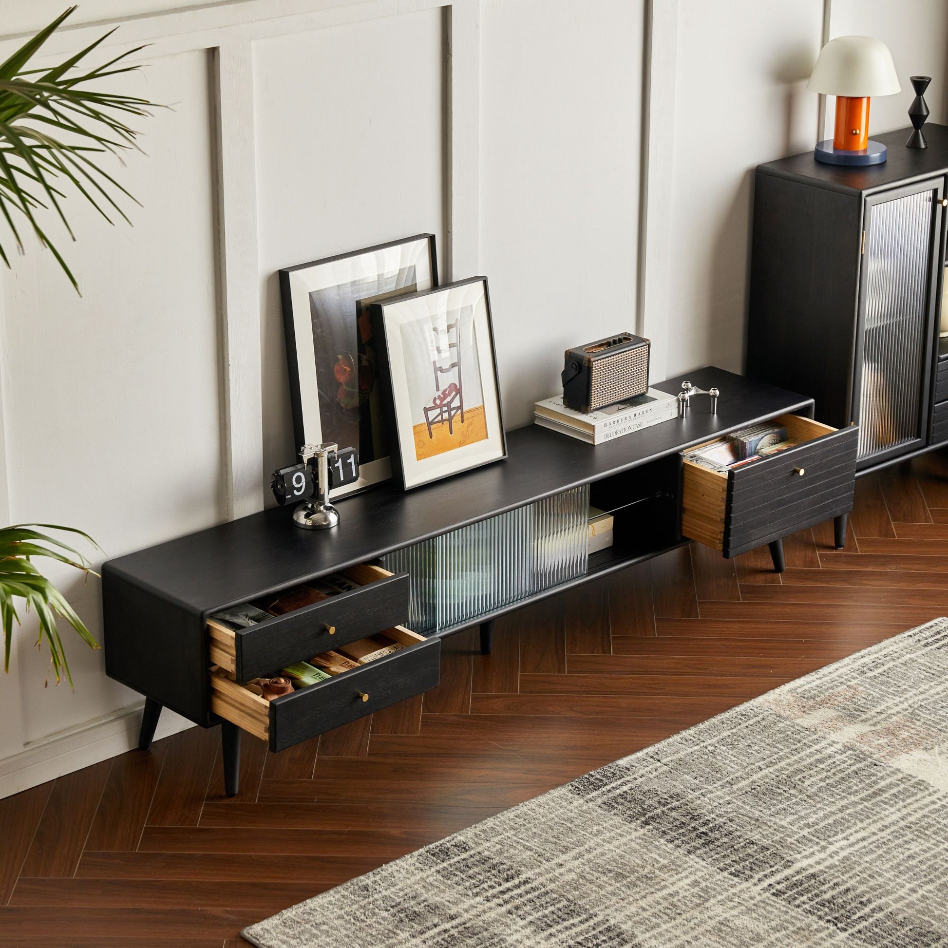 Travis rubber wood tv console in black colour