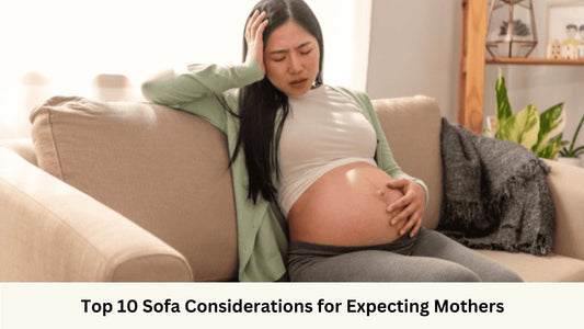 Expecting mother sitting on sofa