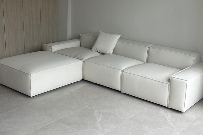 Cubix three module straight modular sofa showing balanced seat widths between two end units and a middle unit upholstered in white pet friendly fabric in living room