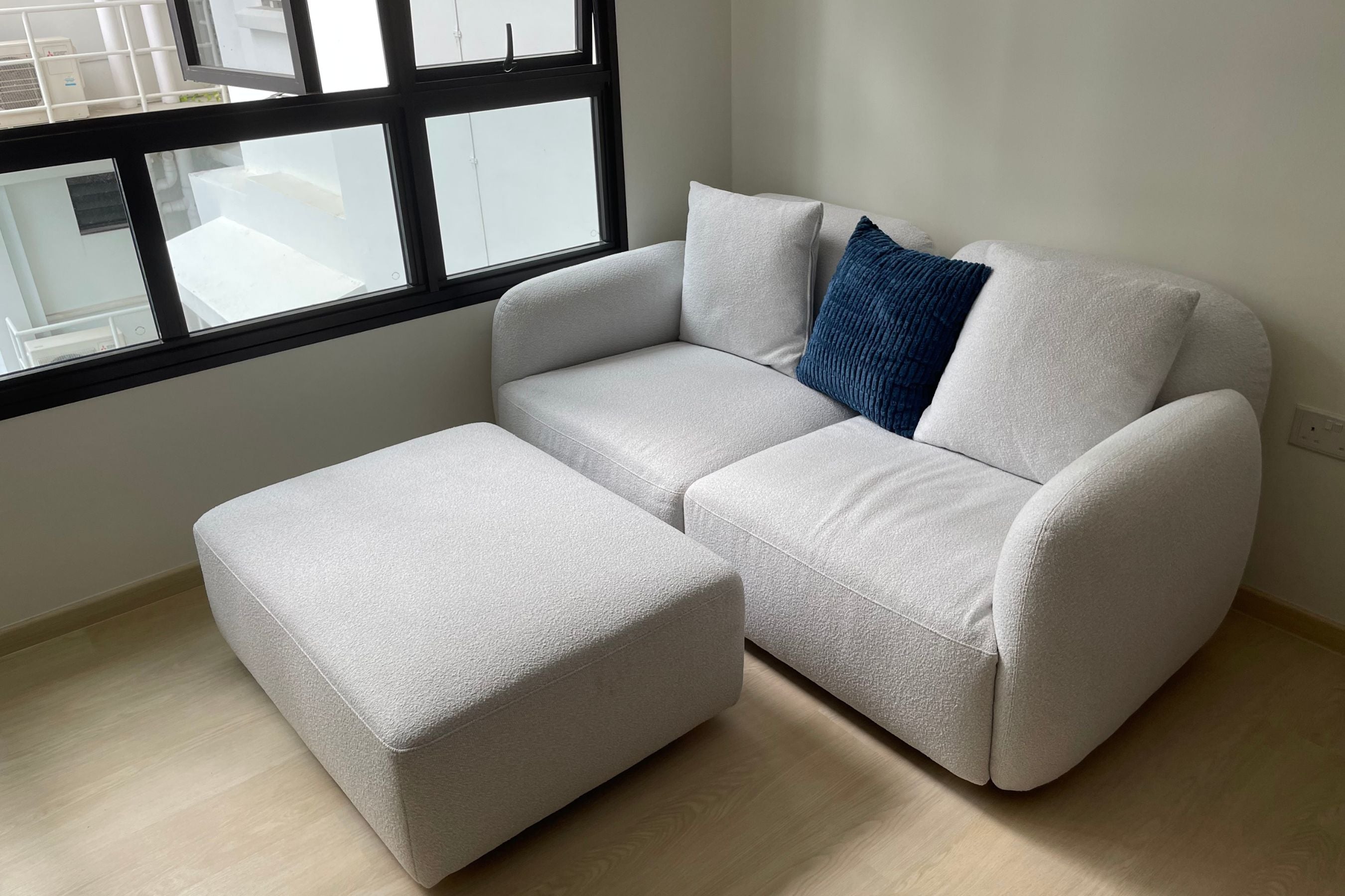 Customized 180cm Light Grey Charmy Sofa in a Small Living Room in Singapore
