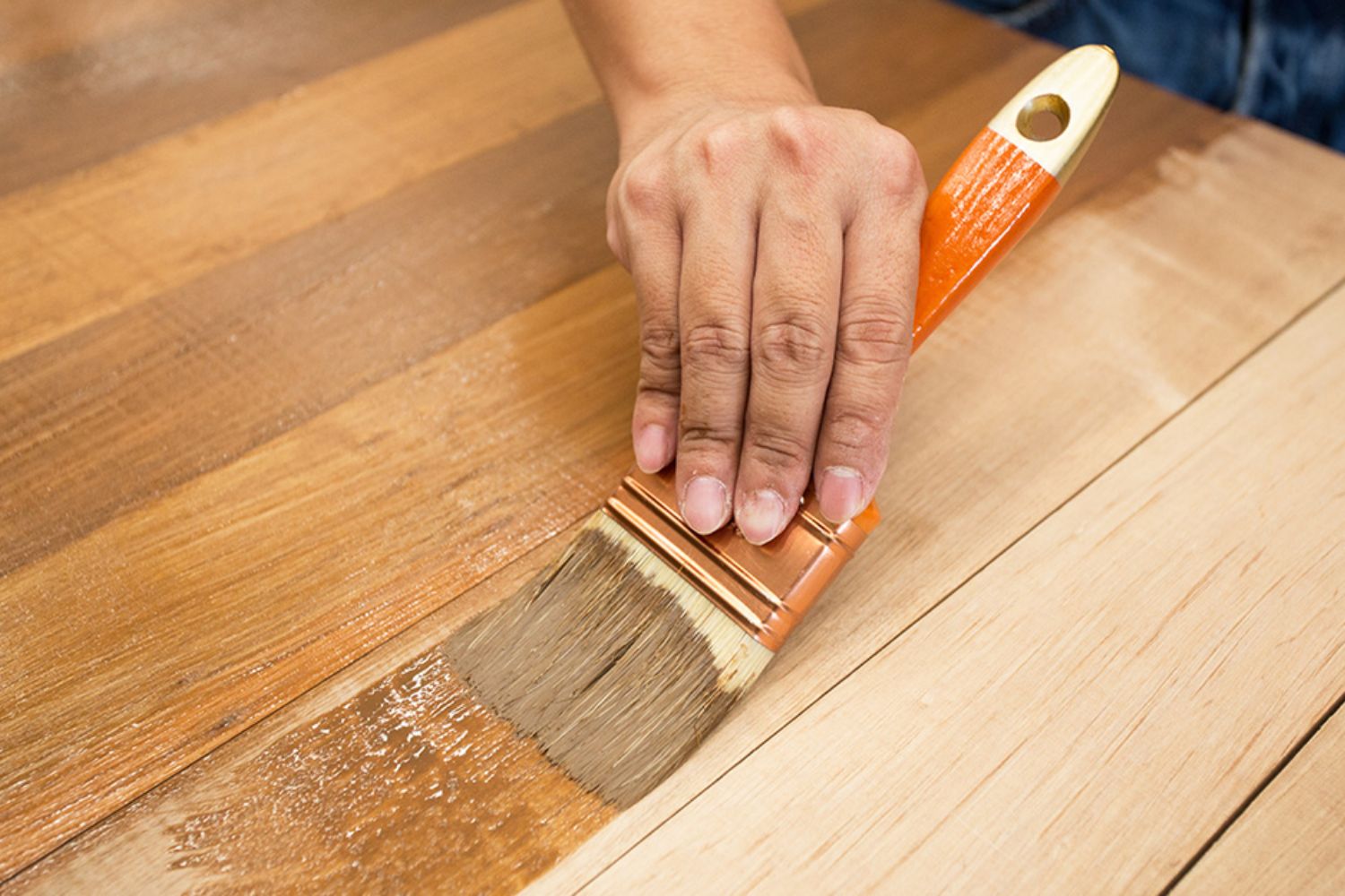 Applying top coat to wood