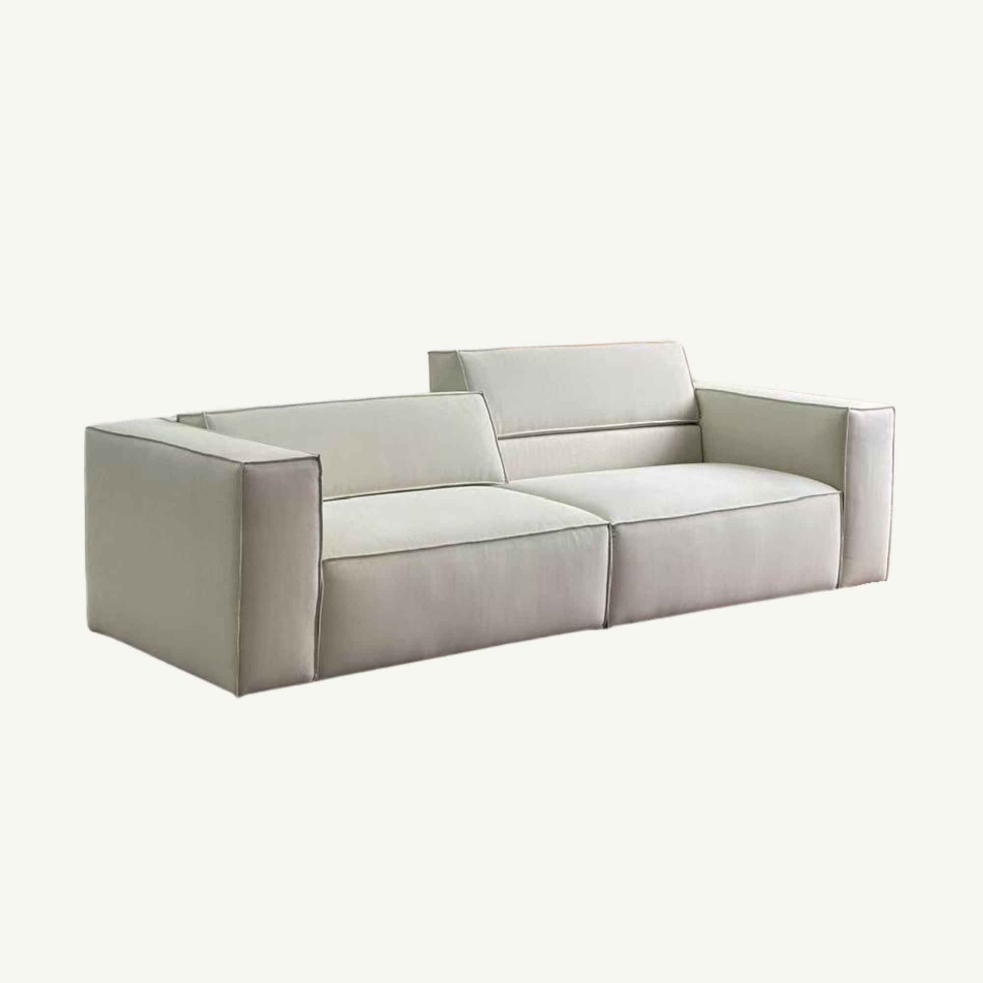 A modern two-seater sofa upholstered in a light beige fabric, shown from a three-quarters angle against a solid off-white background.