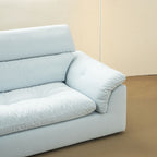 Close-up view of the armrest on the Calla Adjustable Backrest Sofa
