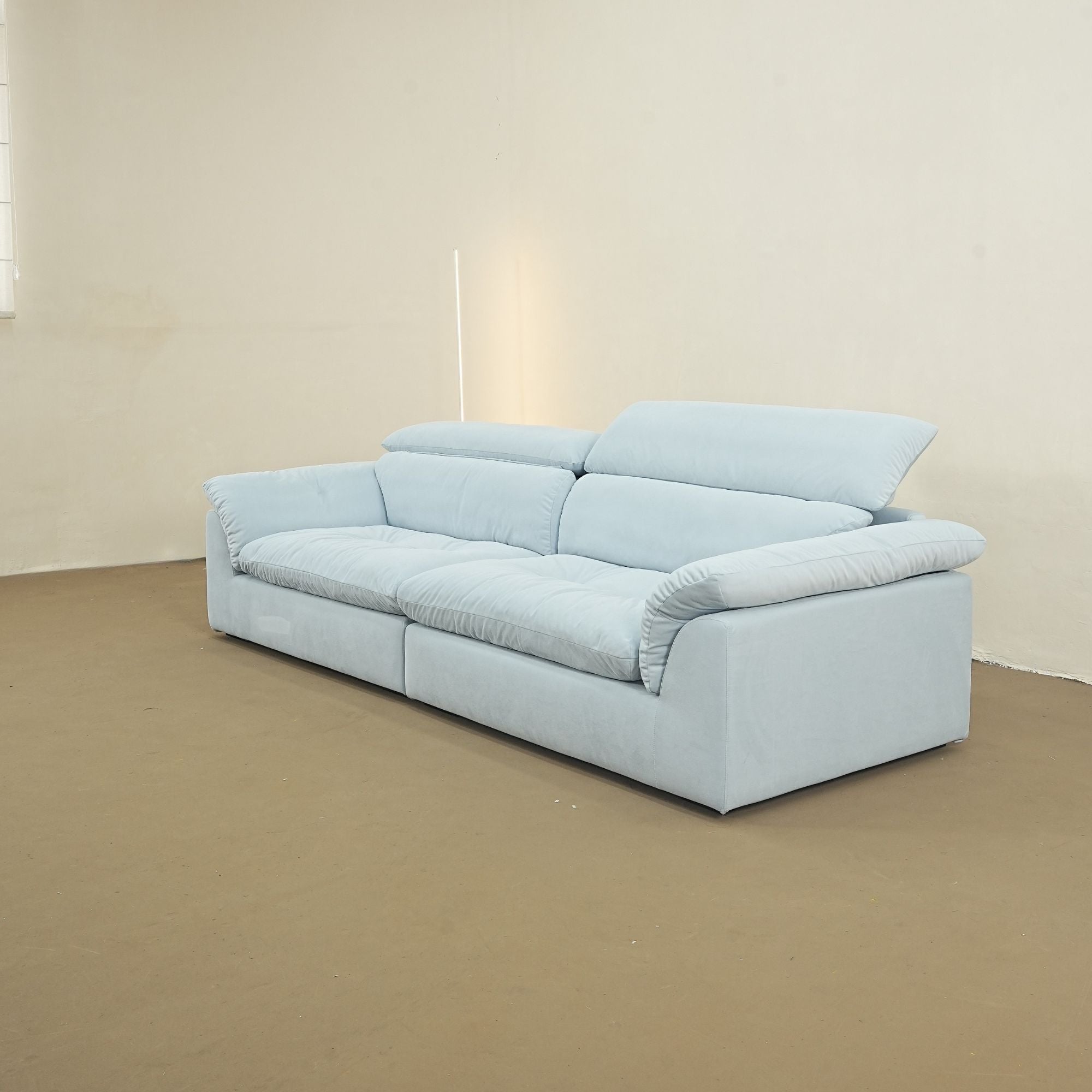 Calla fabric adjustable backrest sofa in blue pet friendly fabric, photo taken on the factory floor