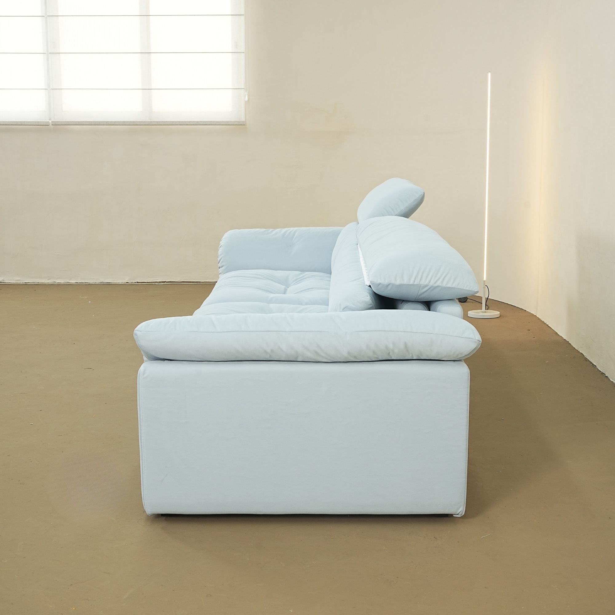 Calla fabric adjustable backrest sofa in blue pet friendly fabric, photo taken on the factory floor