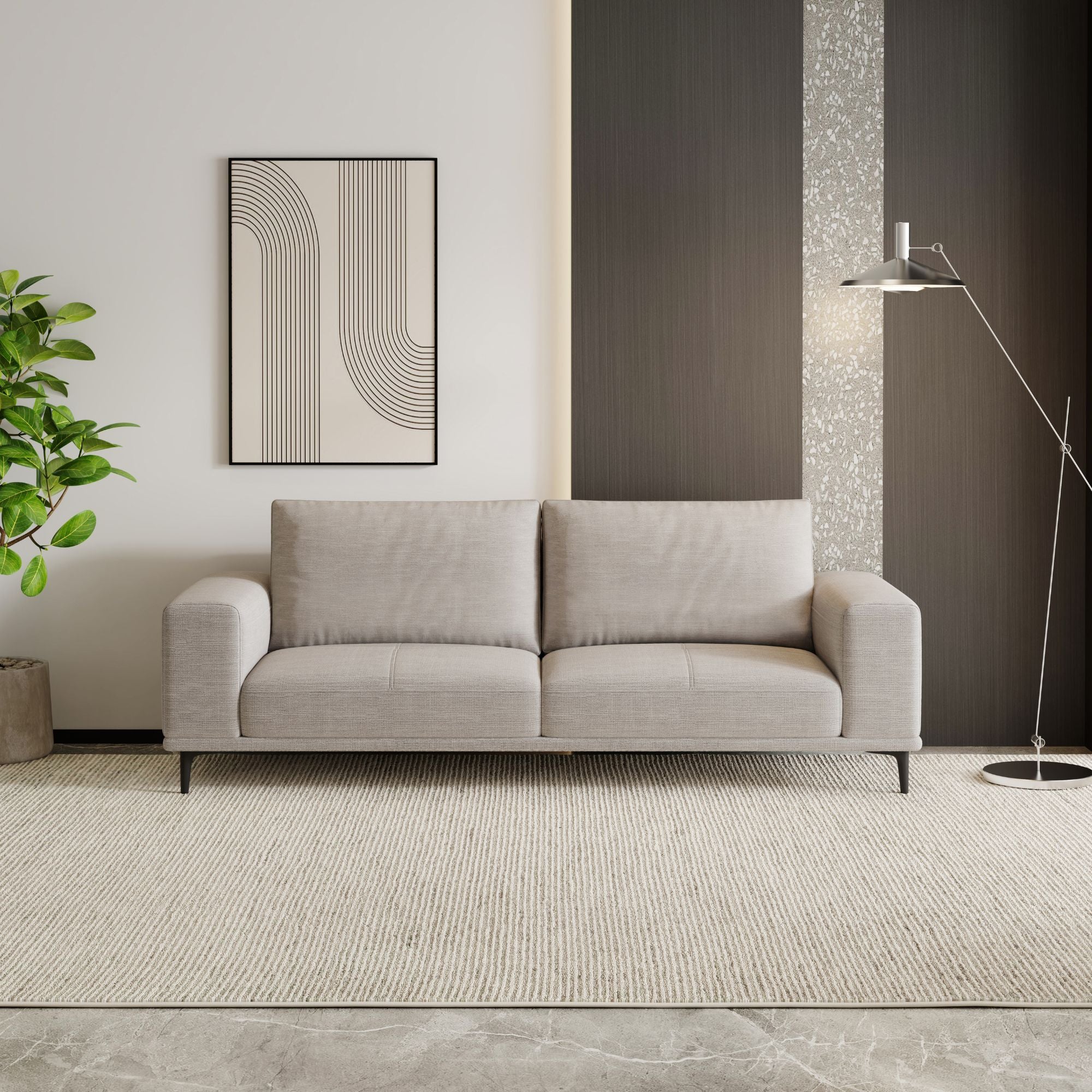 Gray sofa in a modern living room with abstract art and a plant.
