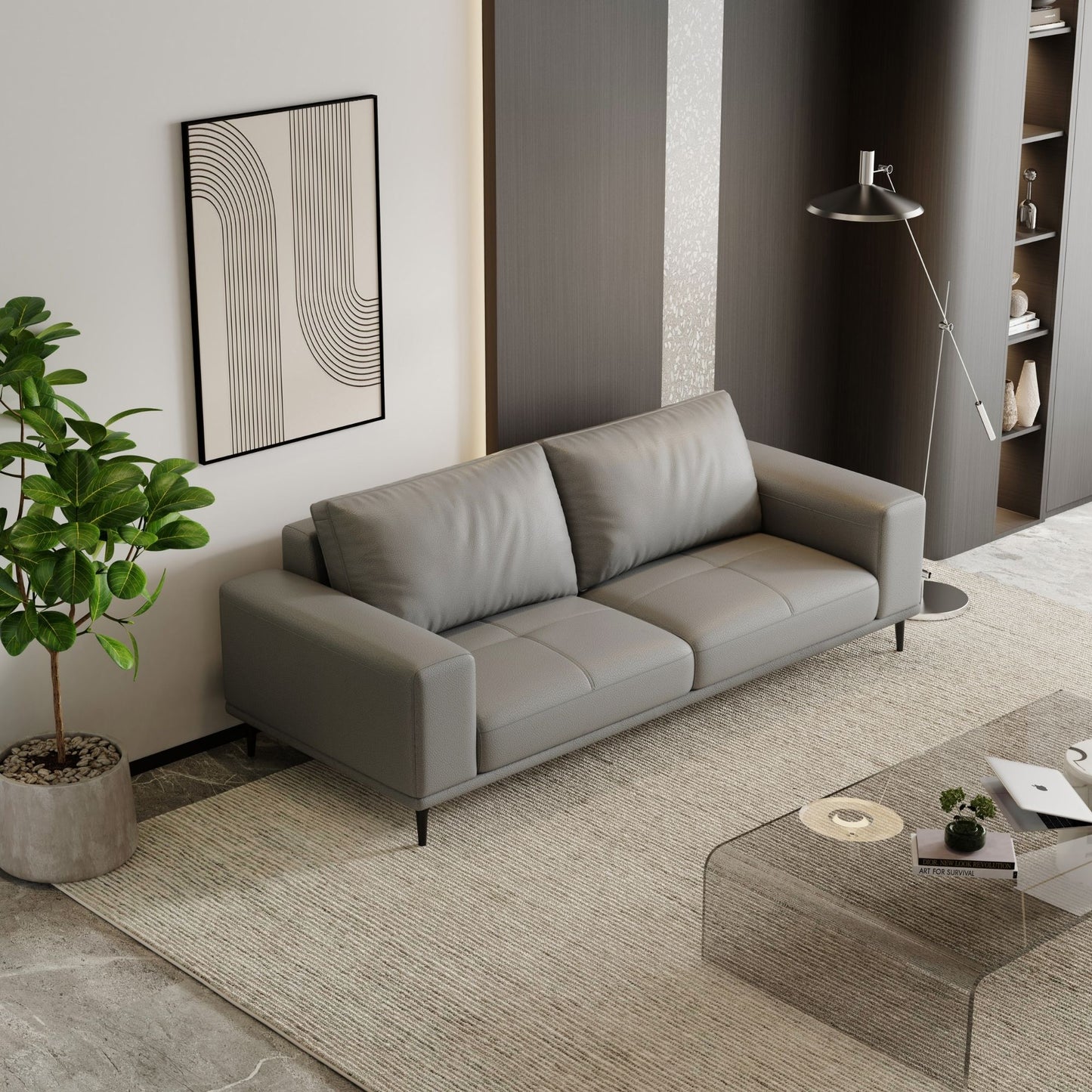 Modern living room with a gray sofa, coffee table, and decorative elements.
