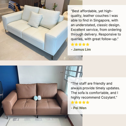 White leather couch in a room with positive reviews displayed.