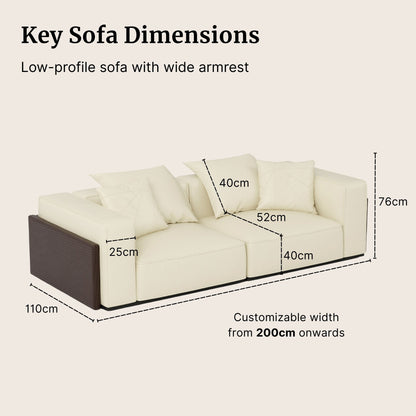 Carson half leather sofa with key sofa dimensions labeled on a beige background