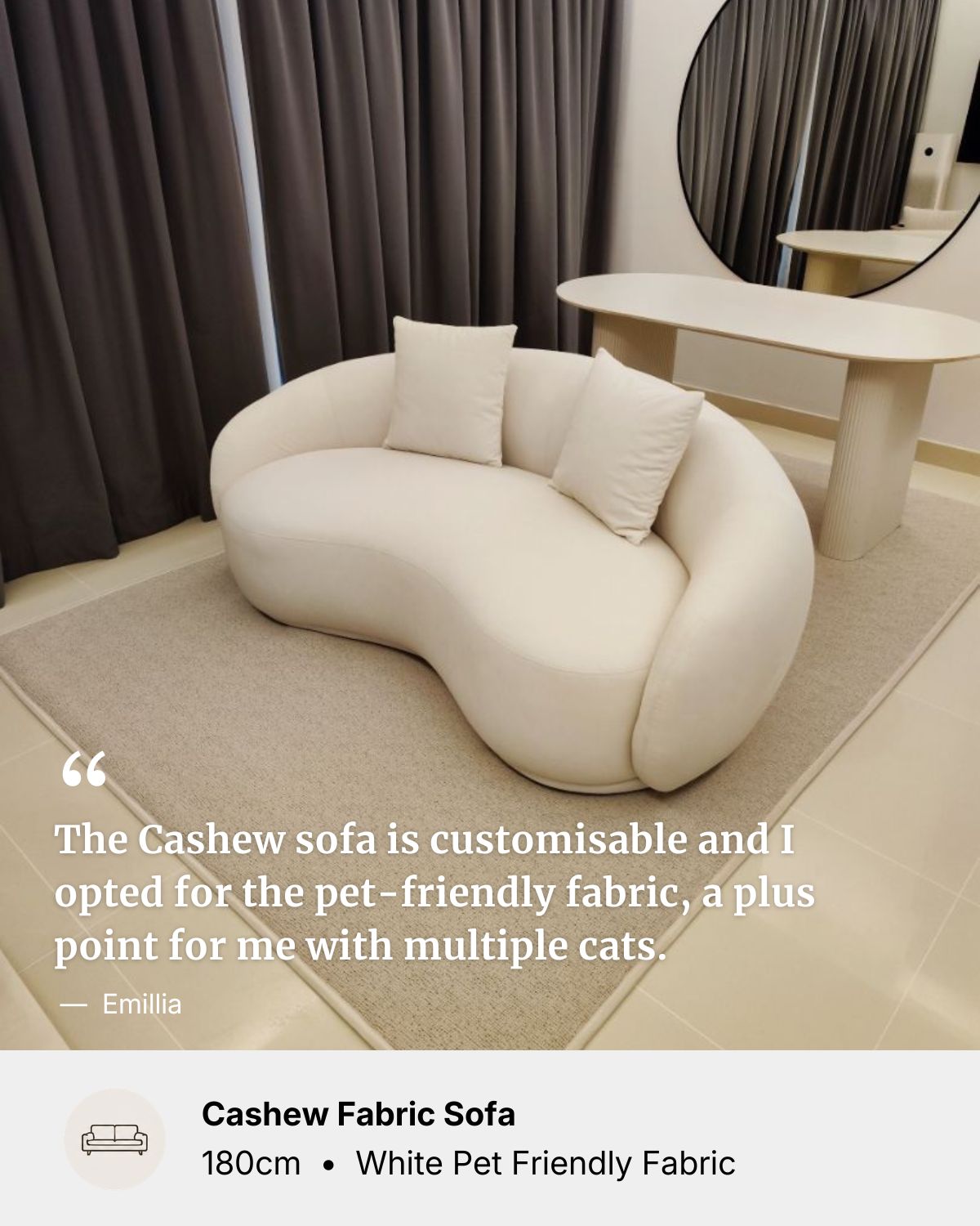 White curved sofa in pet-friendly fabric in a room setting