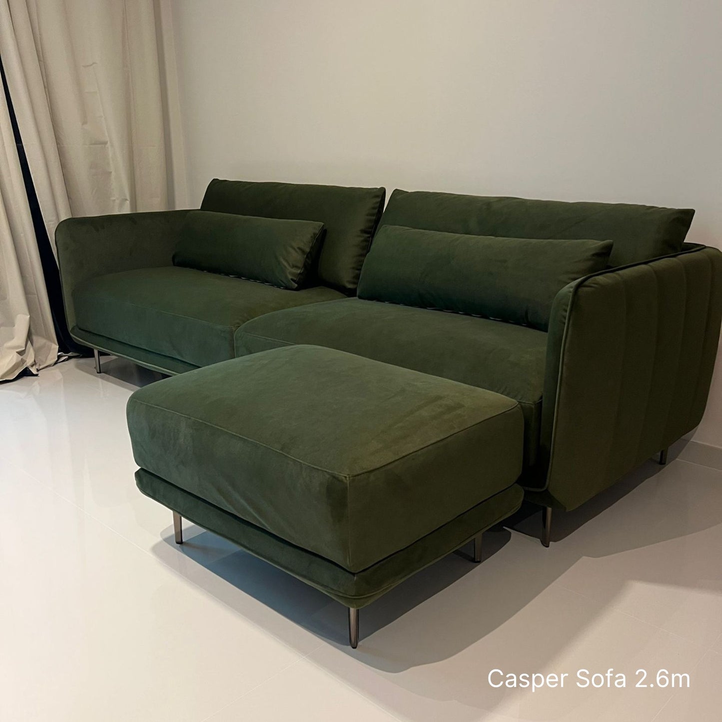 4 seater Casper fabric sofa at 260cm in green pet friendly fabric with matching ottoman at customer's living room
