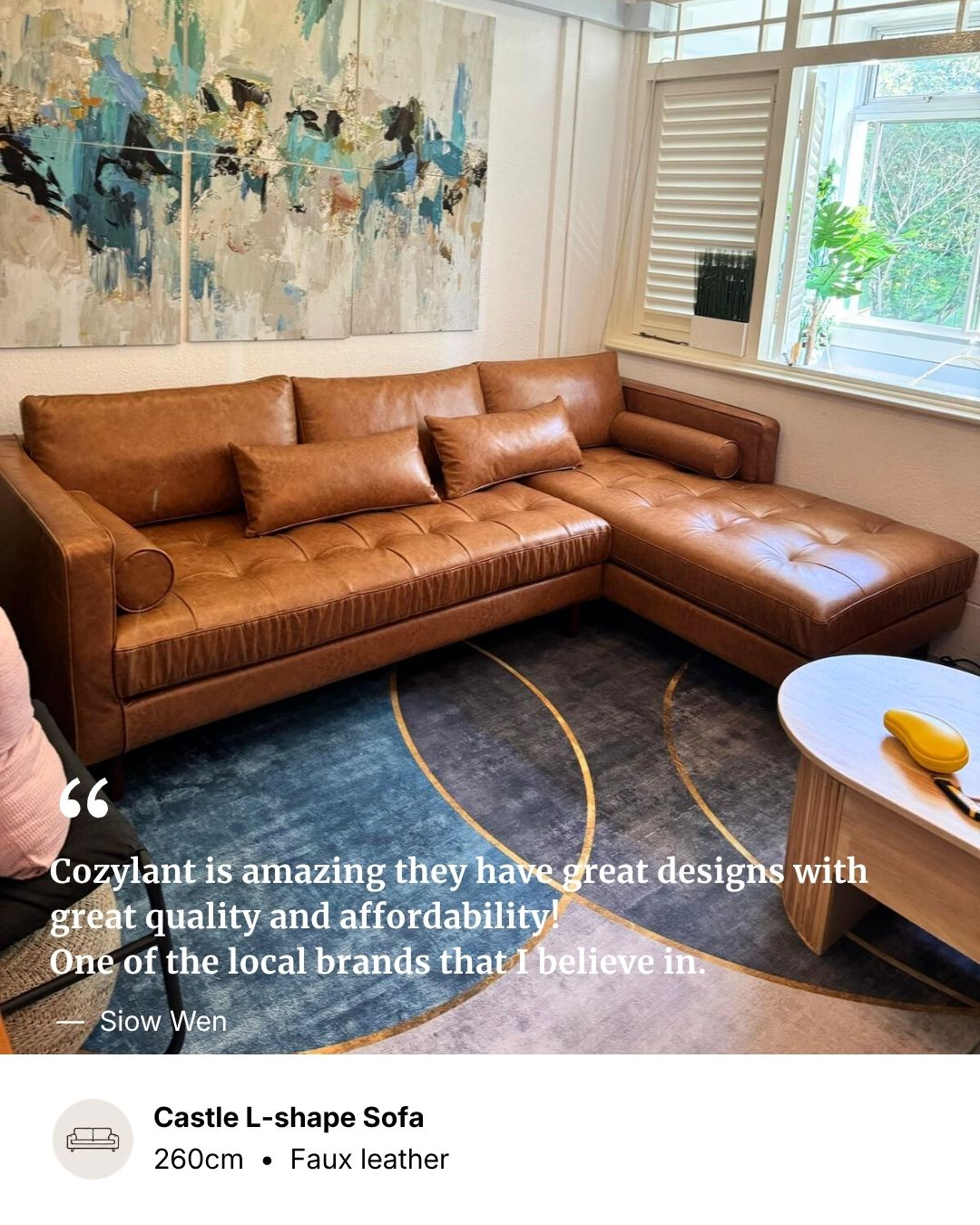 A brown leather L-shaped sectional sofa in a modern living room setting, featuring a tufted chaise lounge on the right side, a dark patterned rug, and a large abstract painting on the wall.