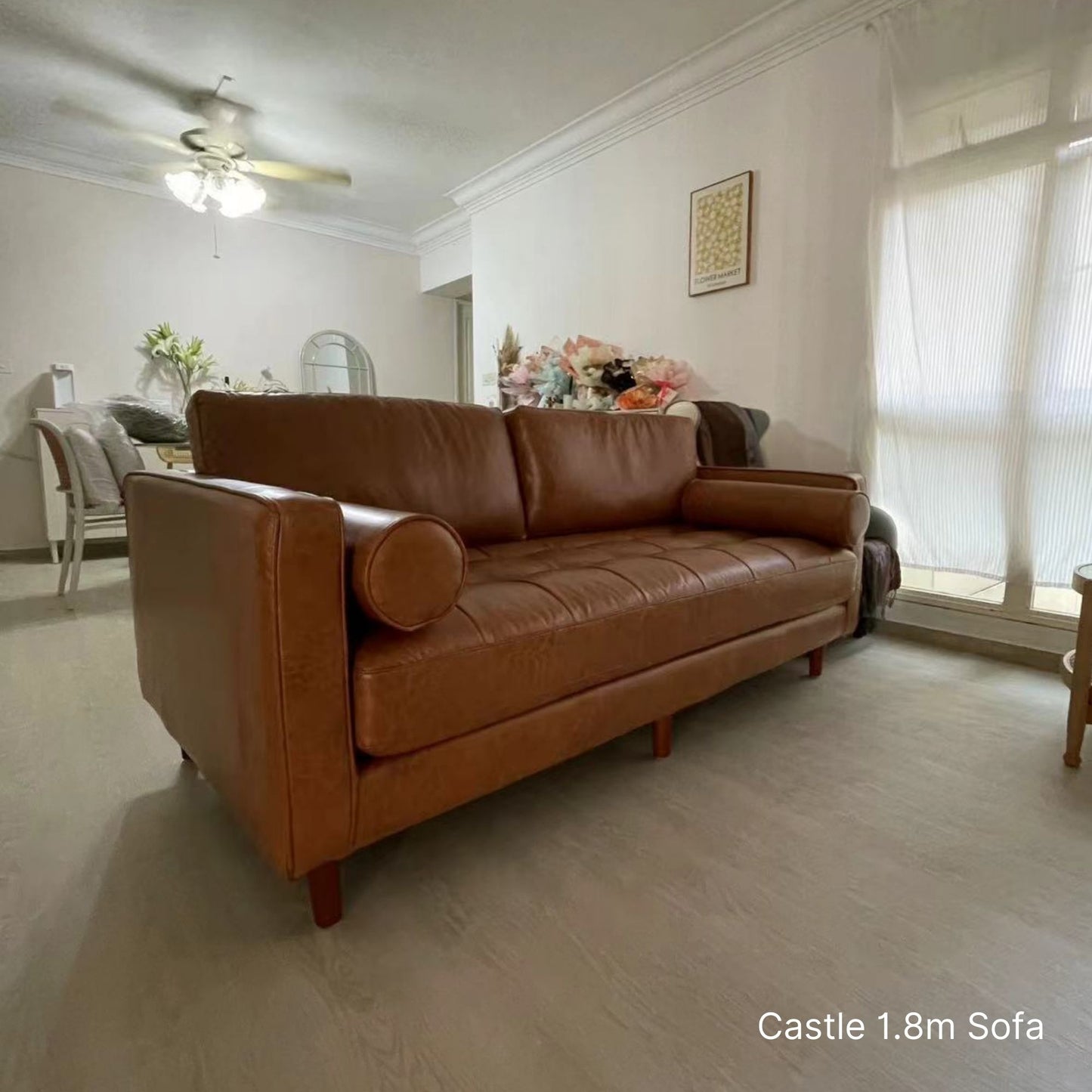 2 seater 180cm Castle brown faux leather sofa in customer's living room
