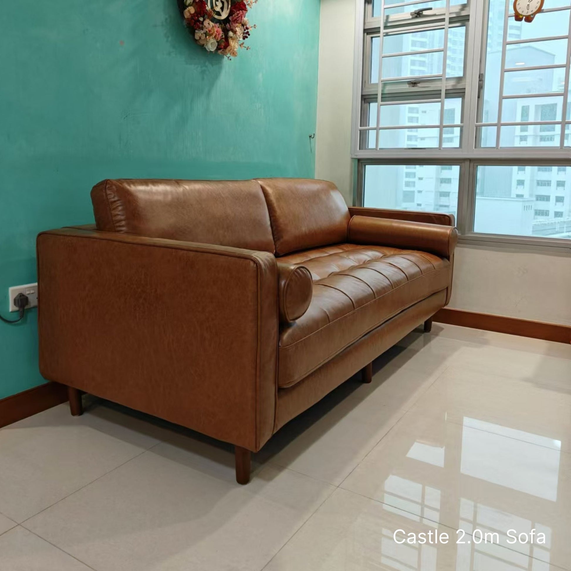 3 seater 200cm Castle brown faux leather sofa in customer's living room