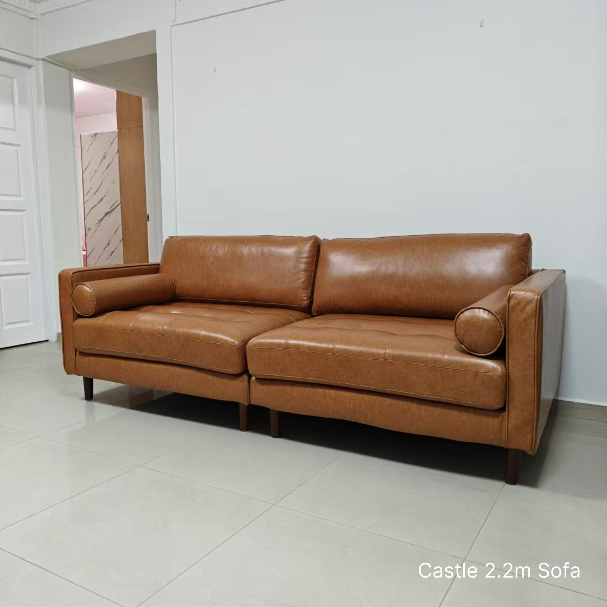 Delivered 3 seater 220cm Castle brown faux leather sofa in customer's living room