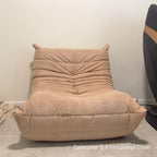 Delivered beige caterpillar lounge chair  to our customer's home next to a massage chair