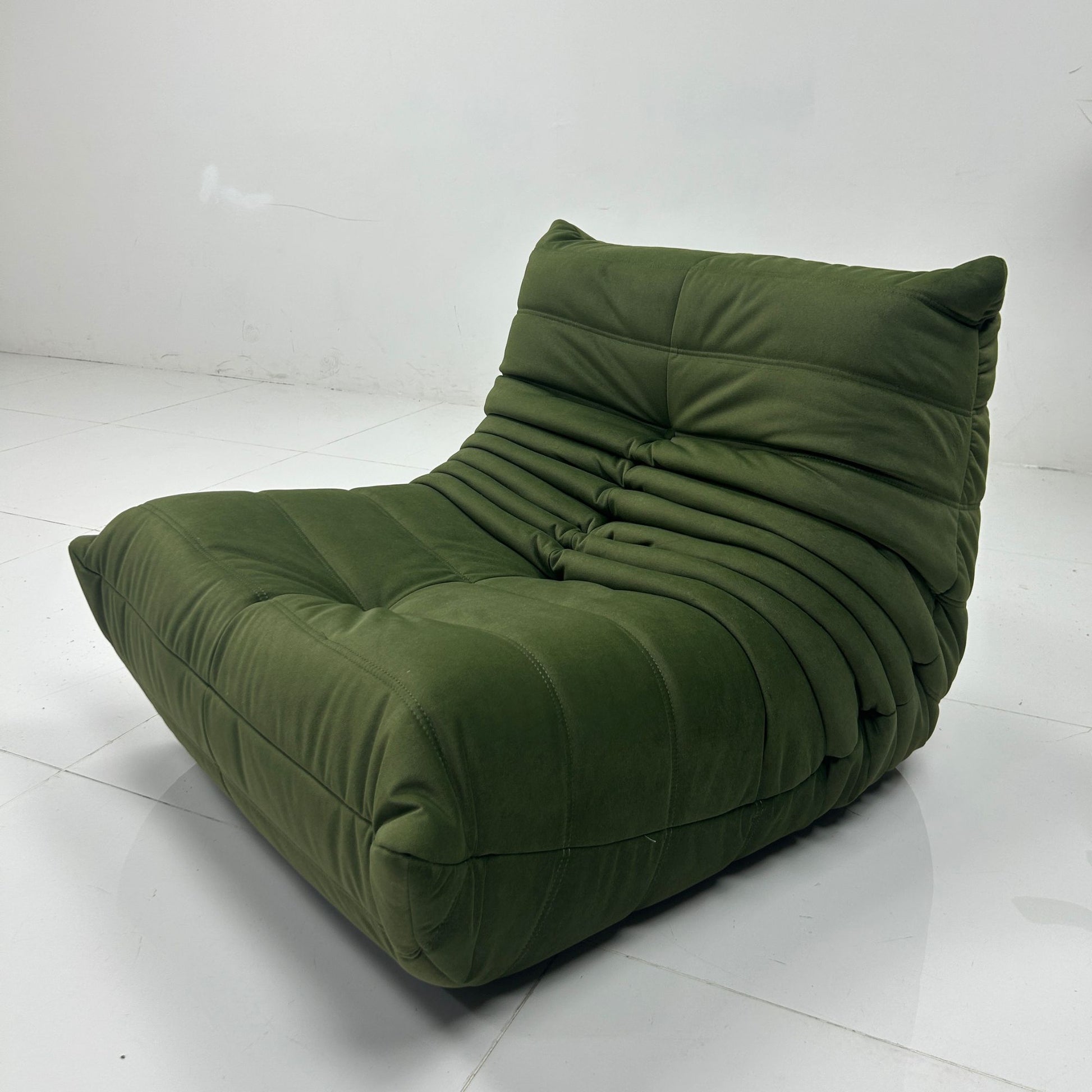 Caterpillar green lounge chair on the factory floor