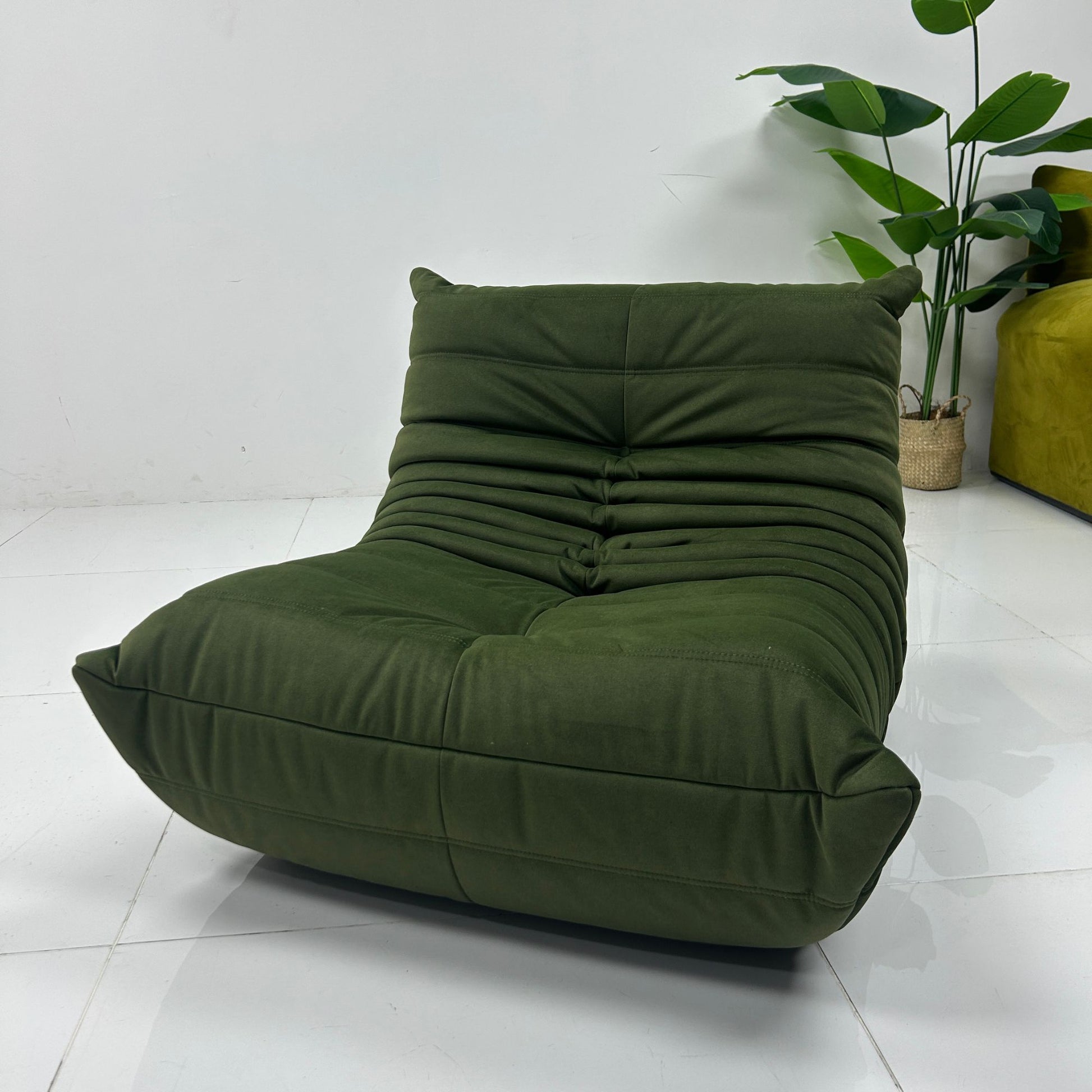 Back view of Caterpillar lounge chair on the factory floor