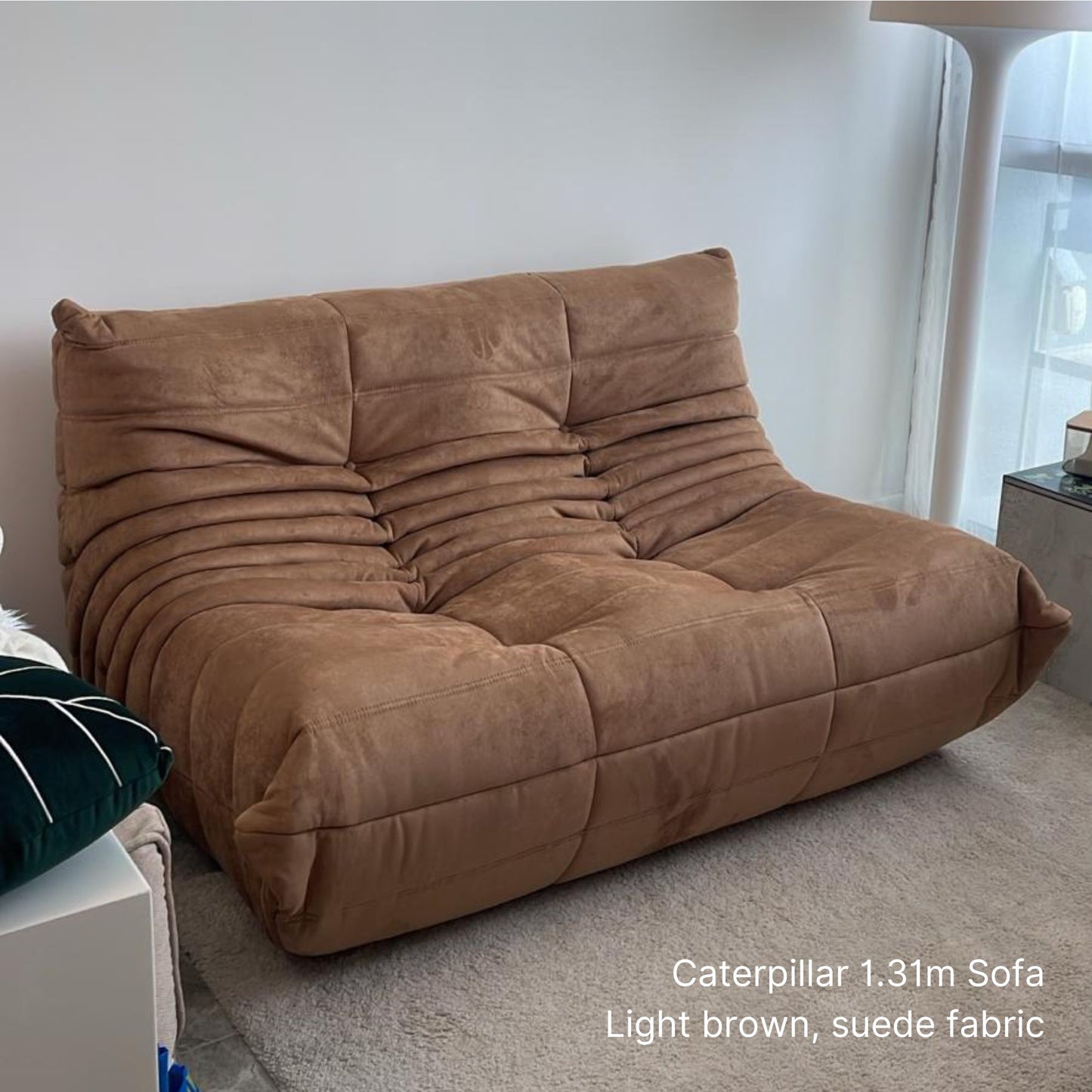 Light brown suede 2 seater 131cm Caterpillar sofa in a room setting.