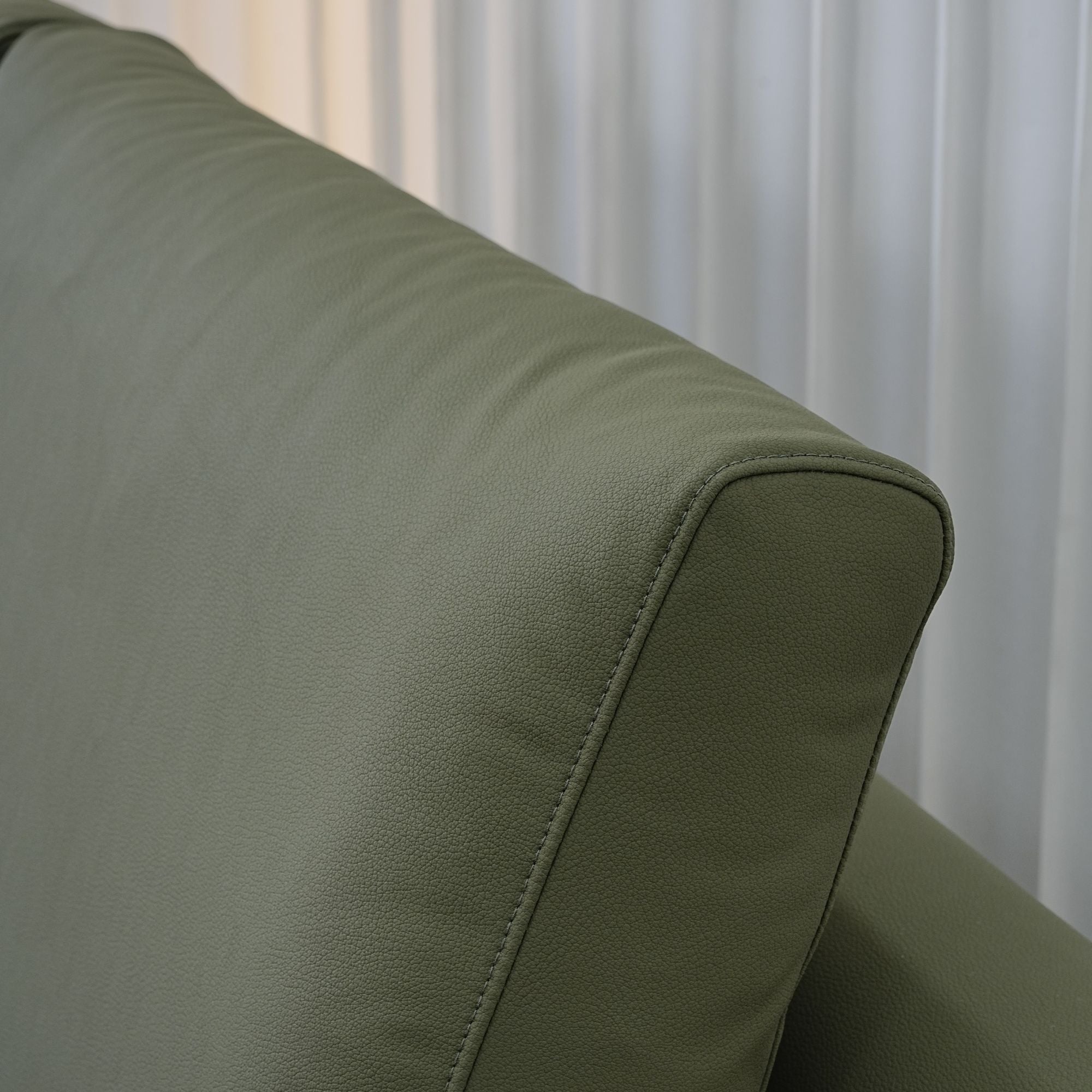 Cedar green faux leather armless sofa
