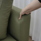 Cedar green faux leather armless sofa