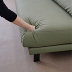 Cedar green faux leather armless sofa