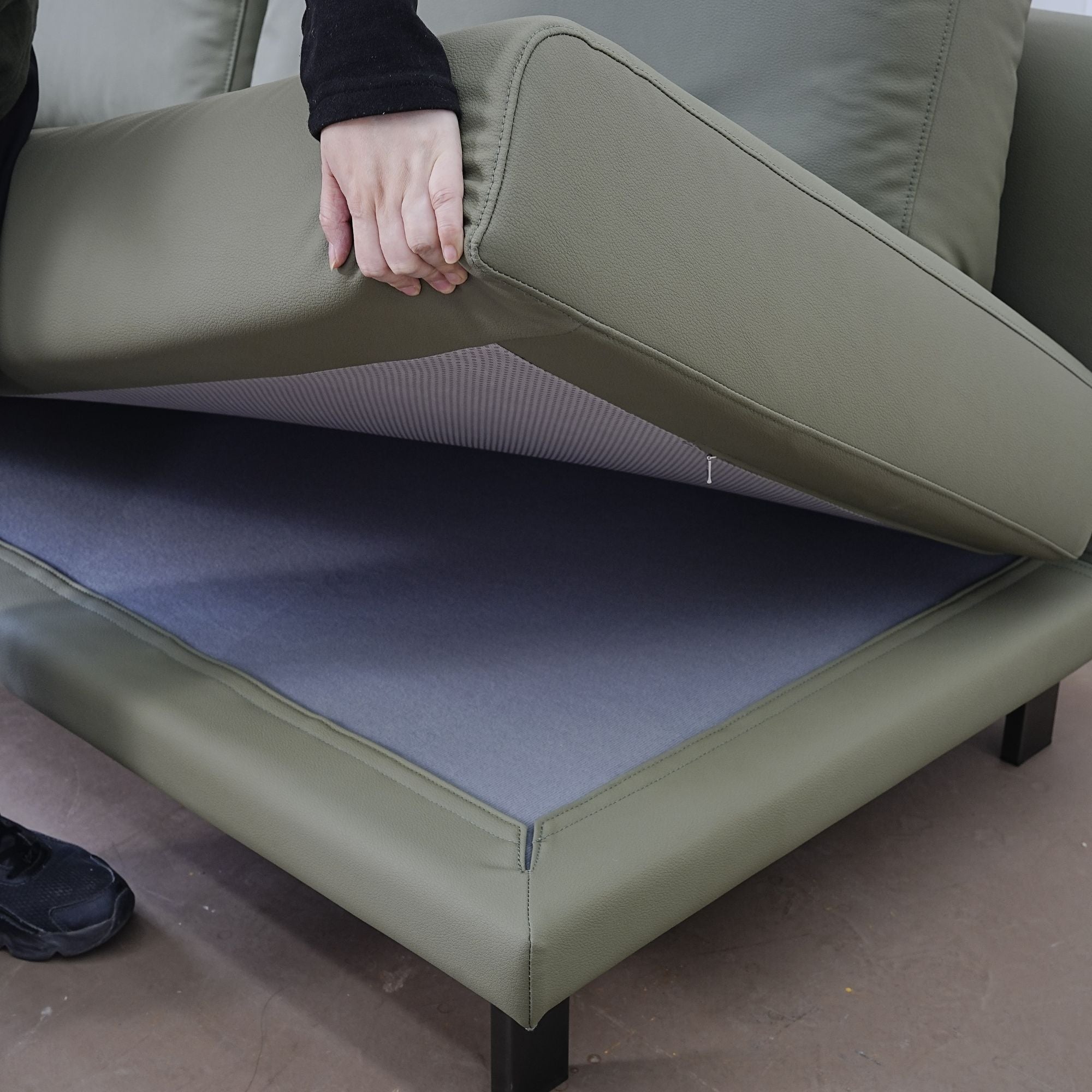 Cedar green faux leather armless sofa