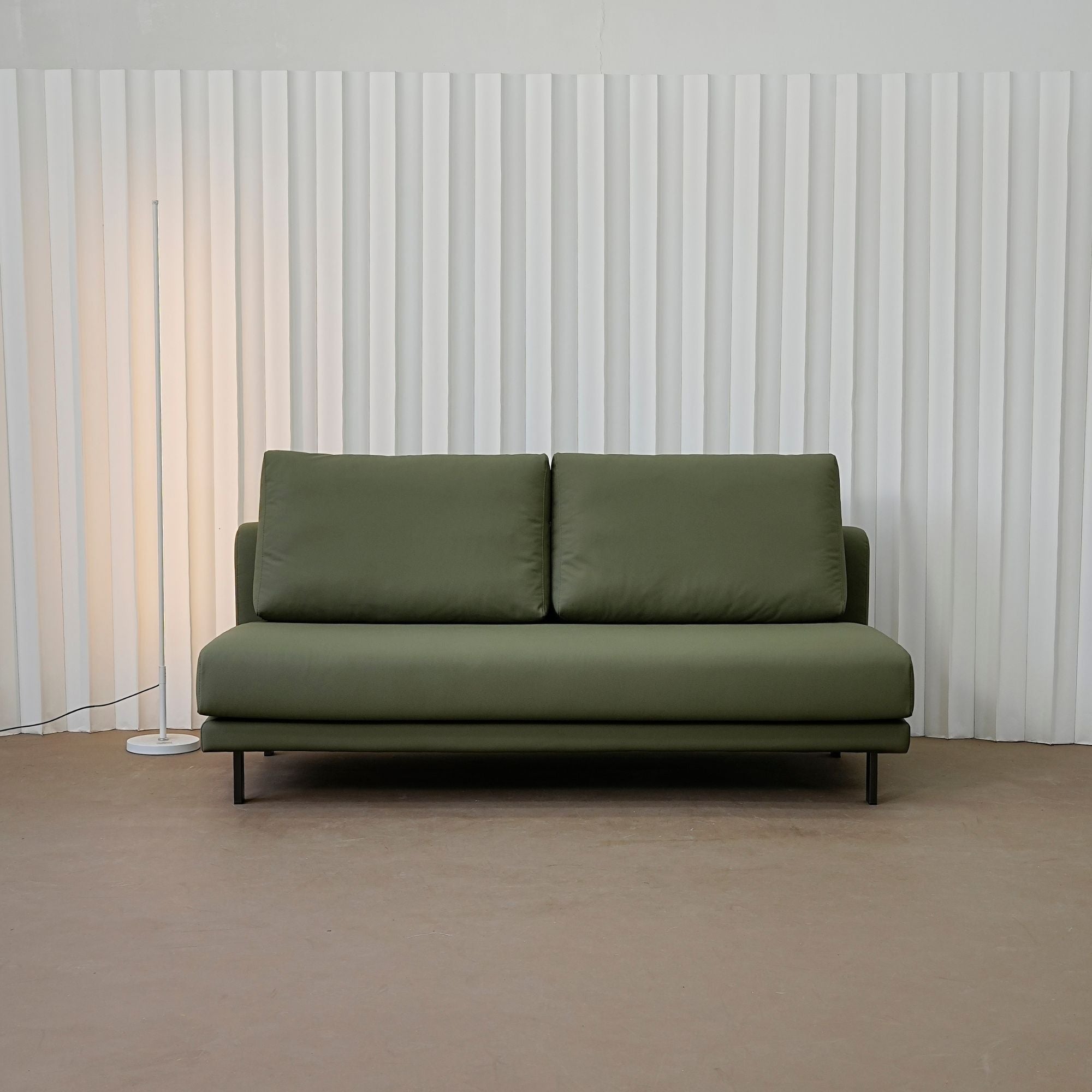 Cedar green faux leather armless sofa