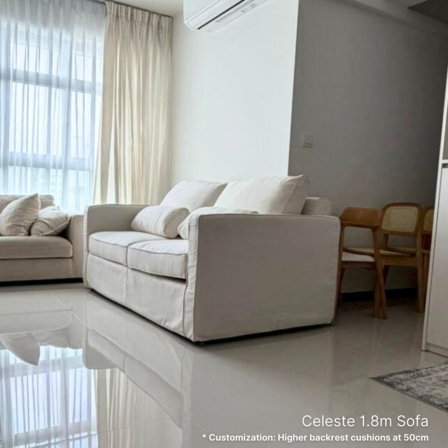 White 2 seater 180cm Celeste fabric sofa in a modern living room with light-colored walls and floor.