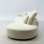 Side view of Celine fabric one arm sofa