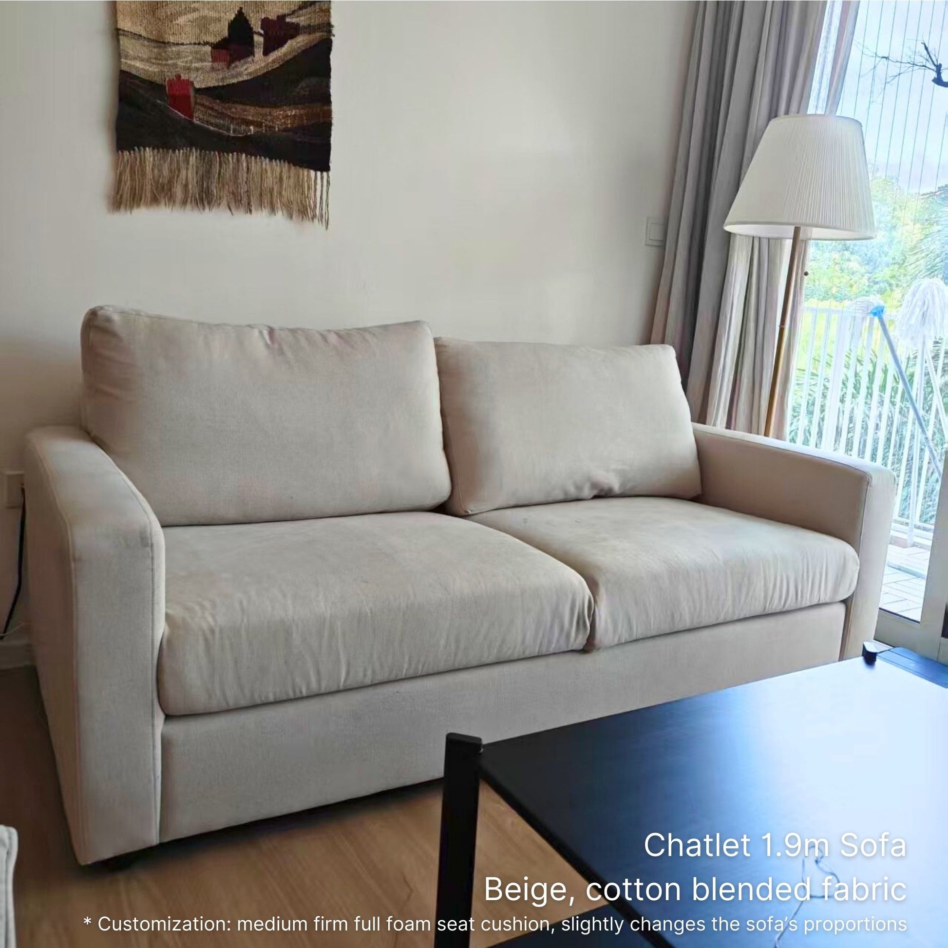Beige cotton blended fabric 2 seater 190cm Chalet fabric sofa in a living room with a lamp and window in the background