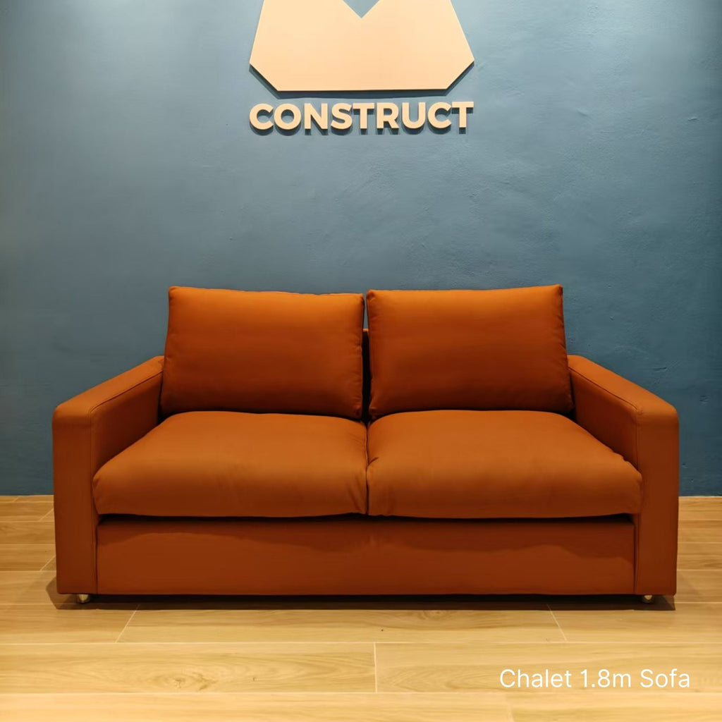 Sample 2 seater brown Chalet half leather sofa at 180cm in our buyer's gym